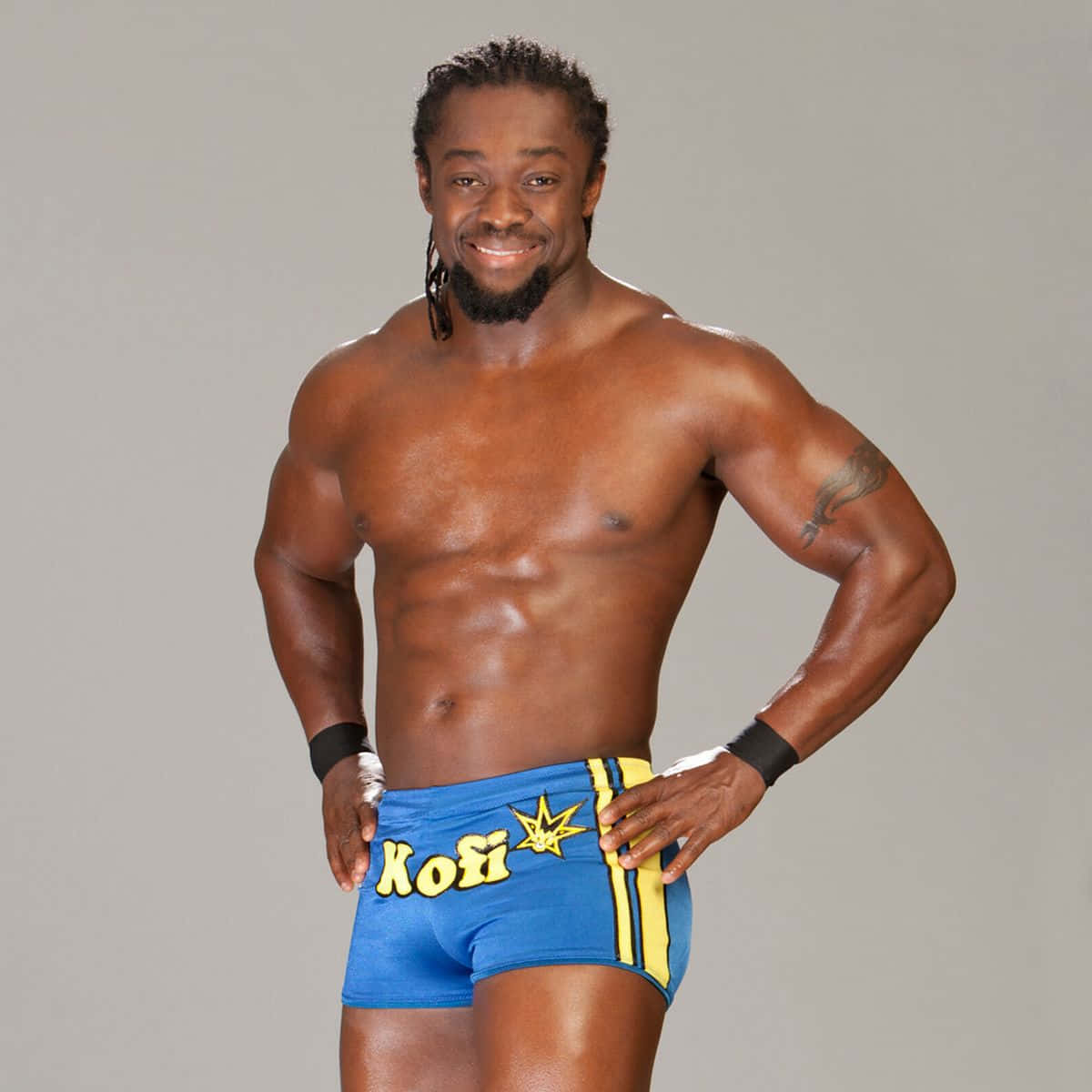 Kofi Kingston, blue and yellow trunks, muscular wrestler, SD Desktop Wallpaper