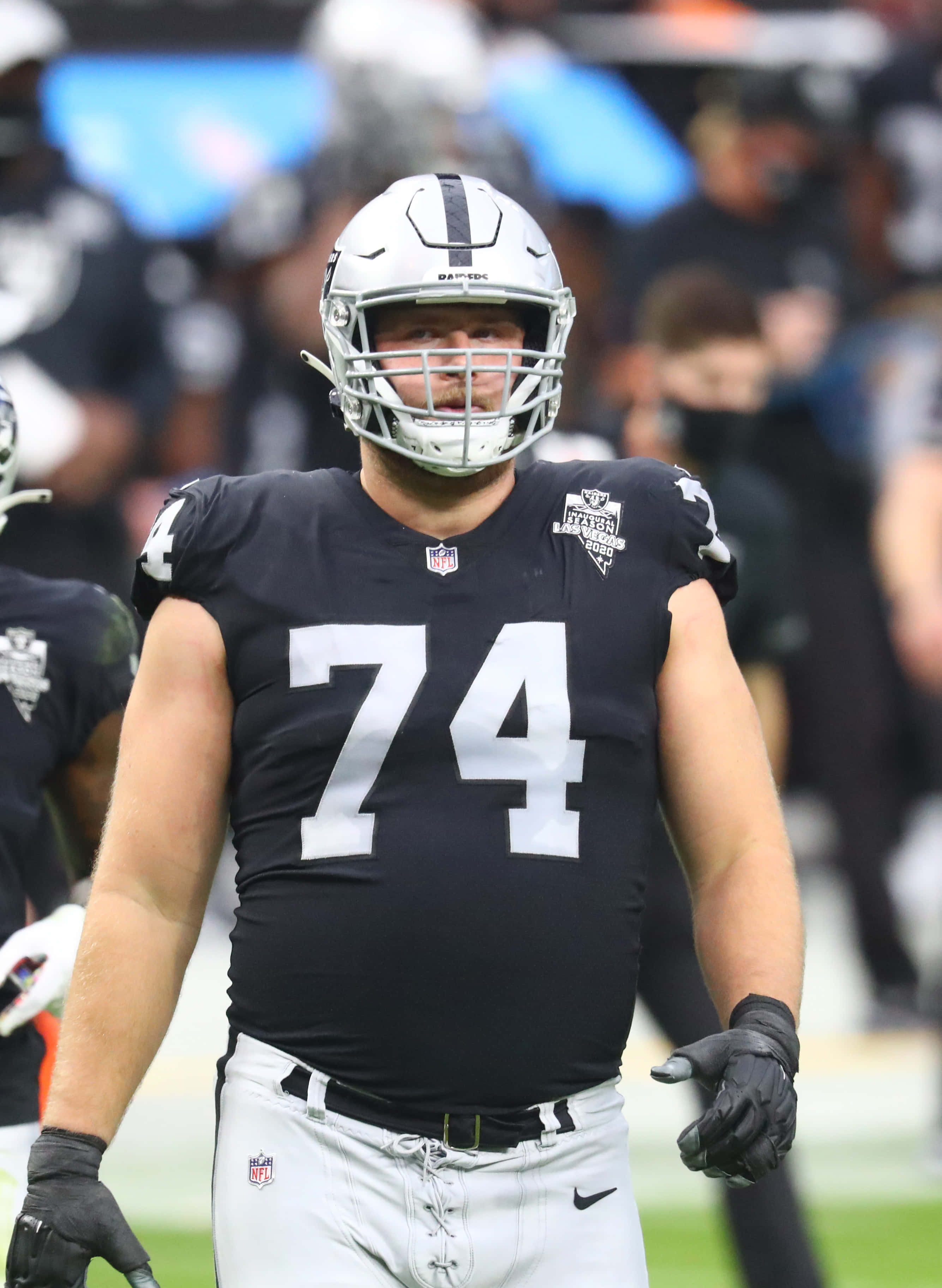 Kolton Miller, NFL offensive tackle, black and silver uniform, 2K Phone Wallpaper