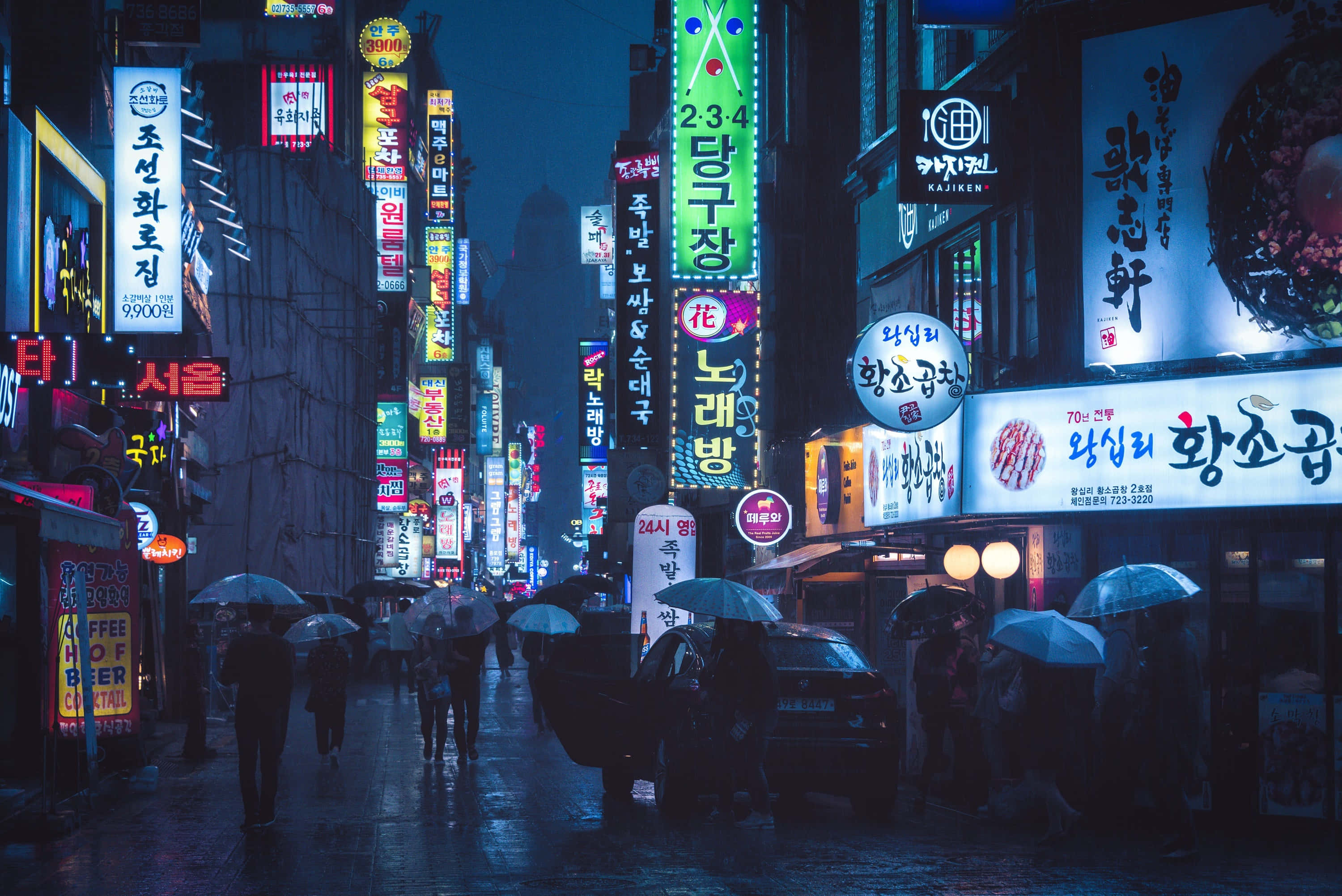 Korean aesthetic computer, rain-slicked city street, neon signs, 2K Desktop Wallpaper