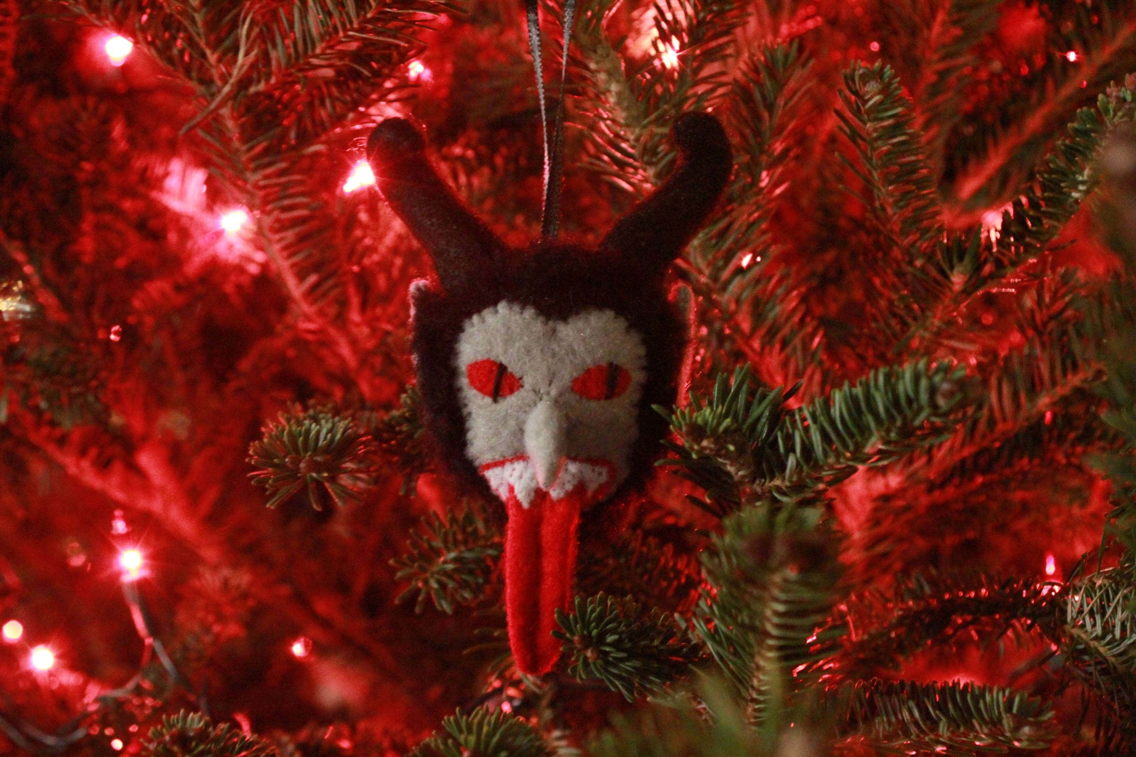 Krampus, red eyes, red-lit pine branches, 4K Desktop Wallpaper