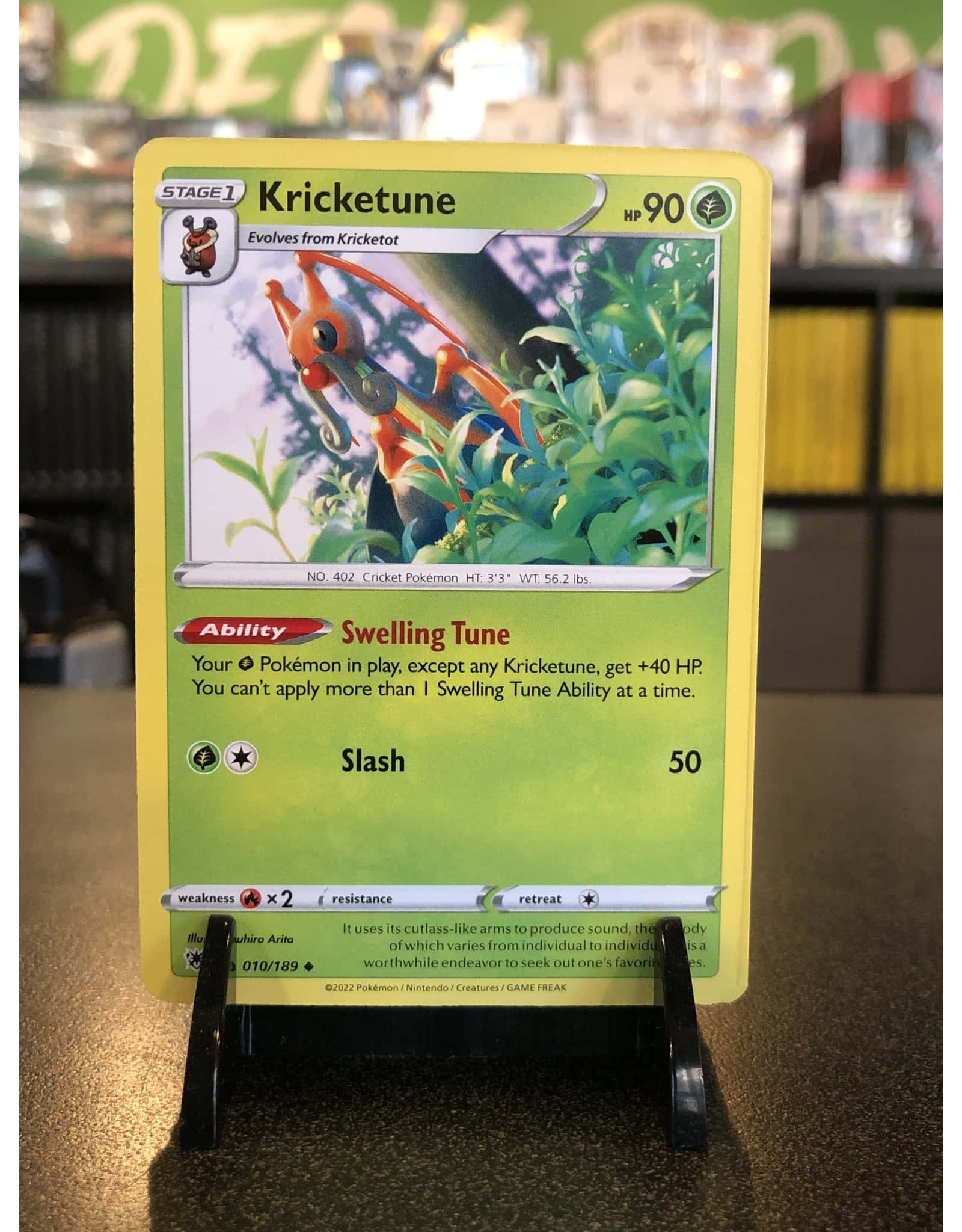 Kricketune, yellow Pokémon card, green foliage, Full HD Phone Wallpaper