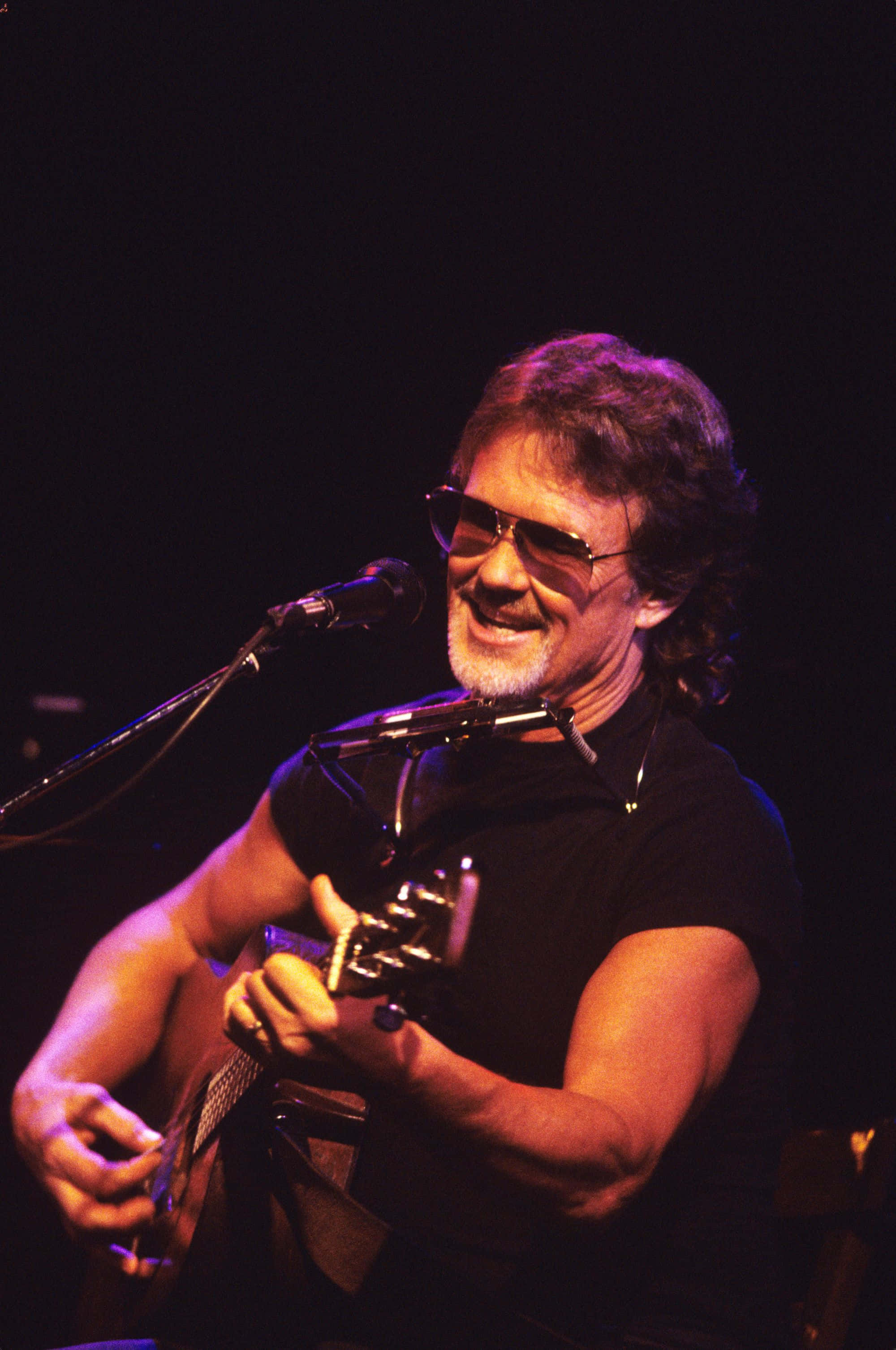 Kris Kristofferson, acoustic guitar, stage lights, 2K Phone Wallpaper