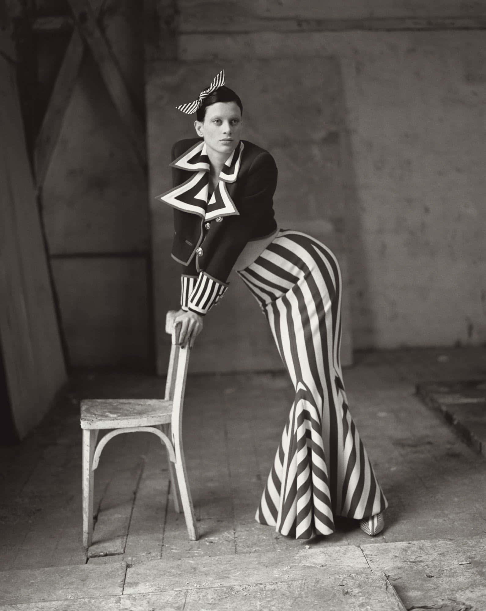 Kristen Mcmenamy, black and white striped outfit, gritty industrial space, Full HD Phone Wallpaper