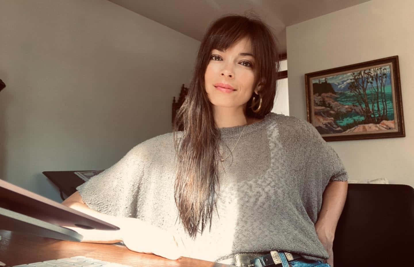 Kristin Kreuk, long dark hair, wooden desk, HD Desktop Wallpaper