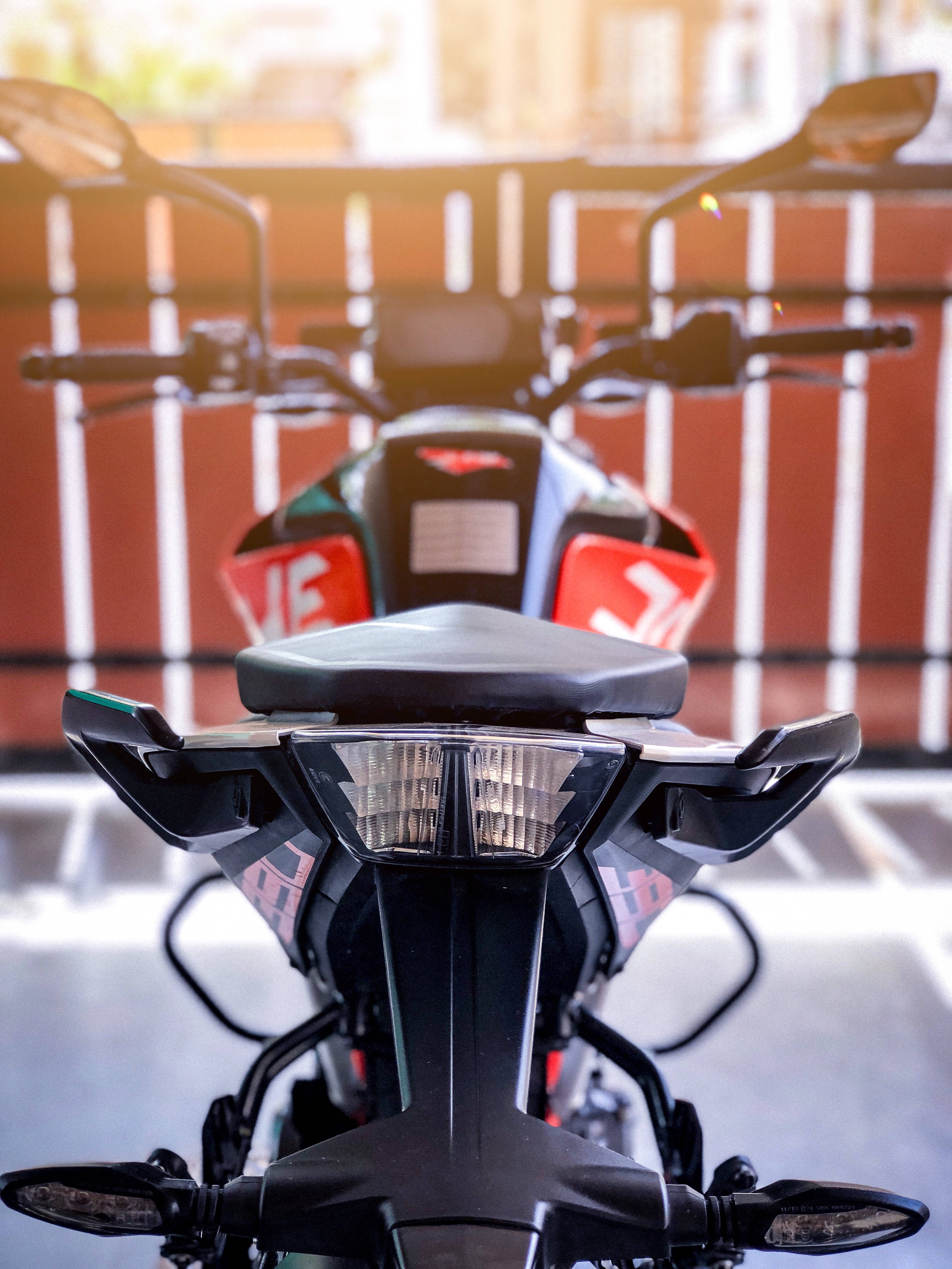 KTM Bike, sleek black motorcycle, red accents, 4K Phone Wallpaper