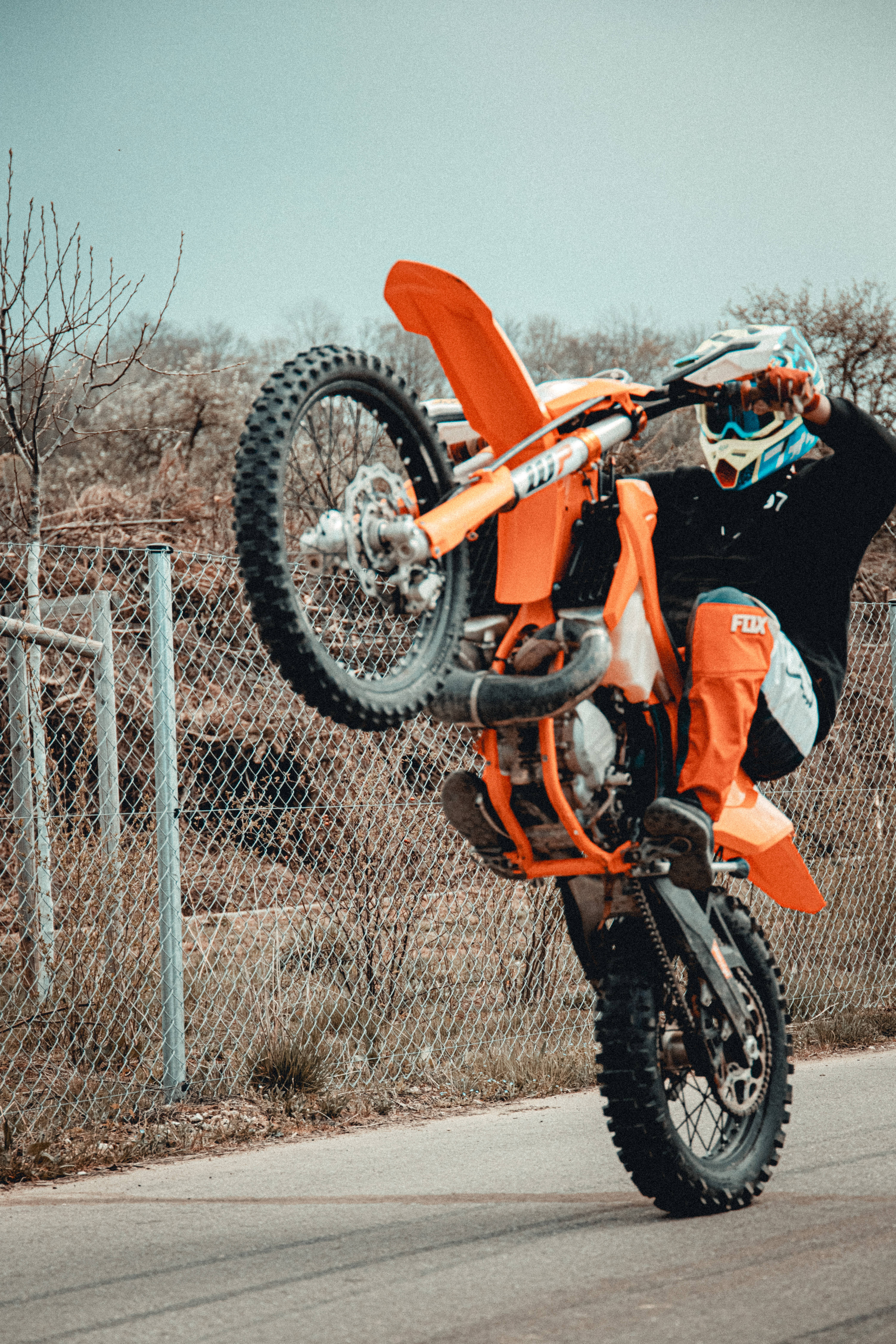 KTM Bike, wheelie, orange gear, 5K Phone Wallpaper