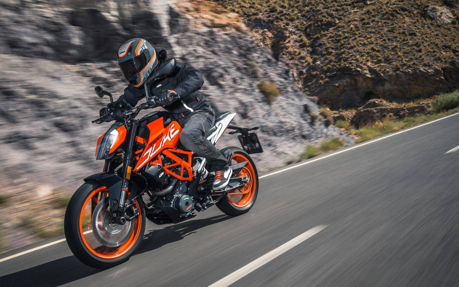 KTM Duke 390, vibrant orange, winding mountain road, HD Desktop Wallpaper