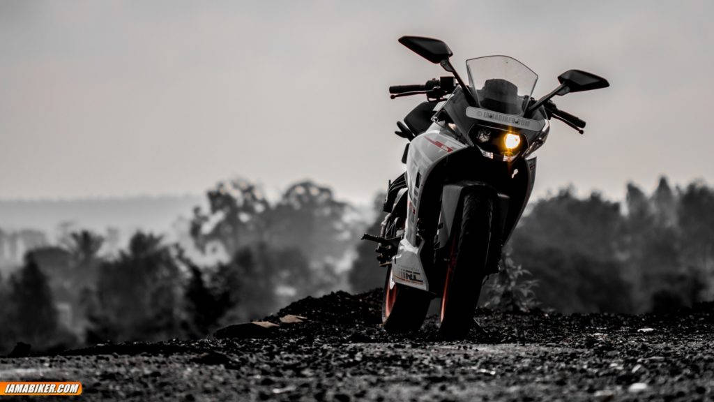 KTM RC 390, glowing headlight, gravel hill, SD Desktop Wallpaper