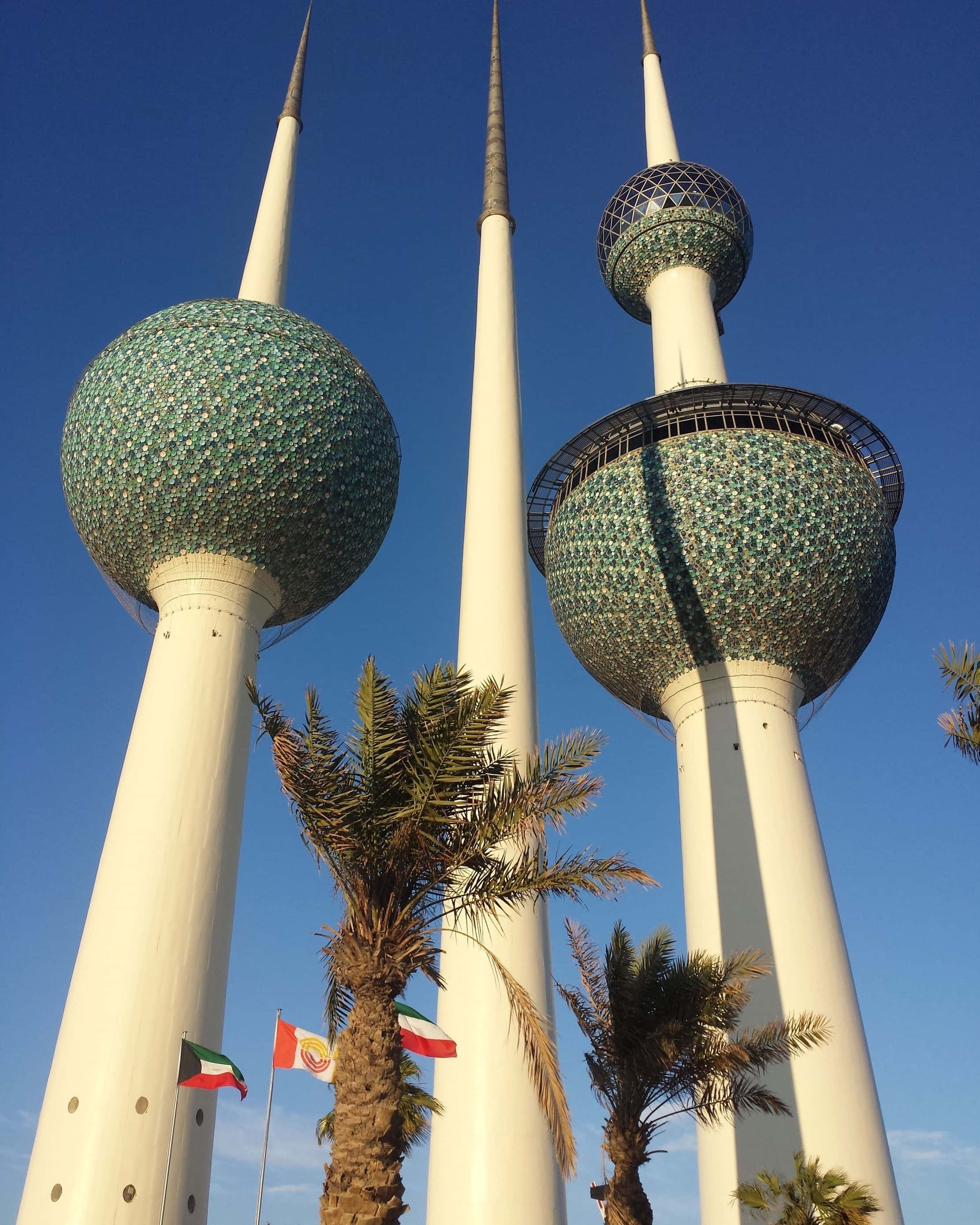 Kuwait Towers, clear blue sky, palm trees, 2K Phone Wallpaper