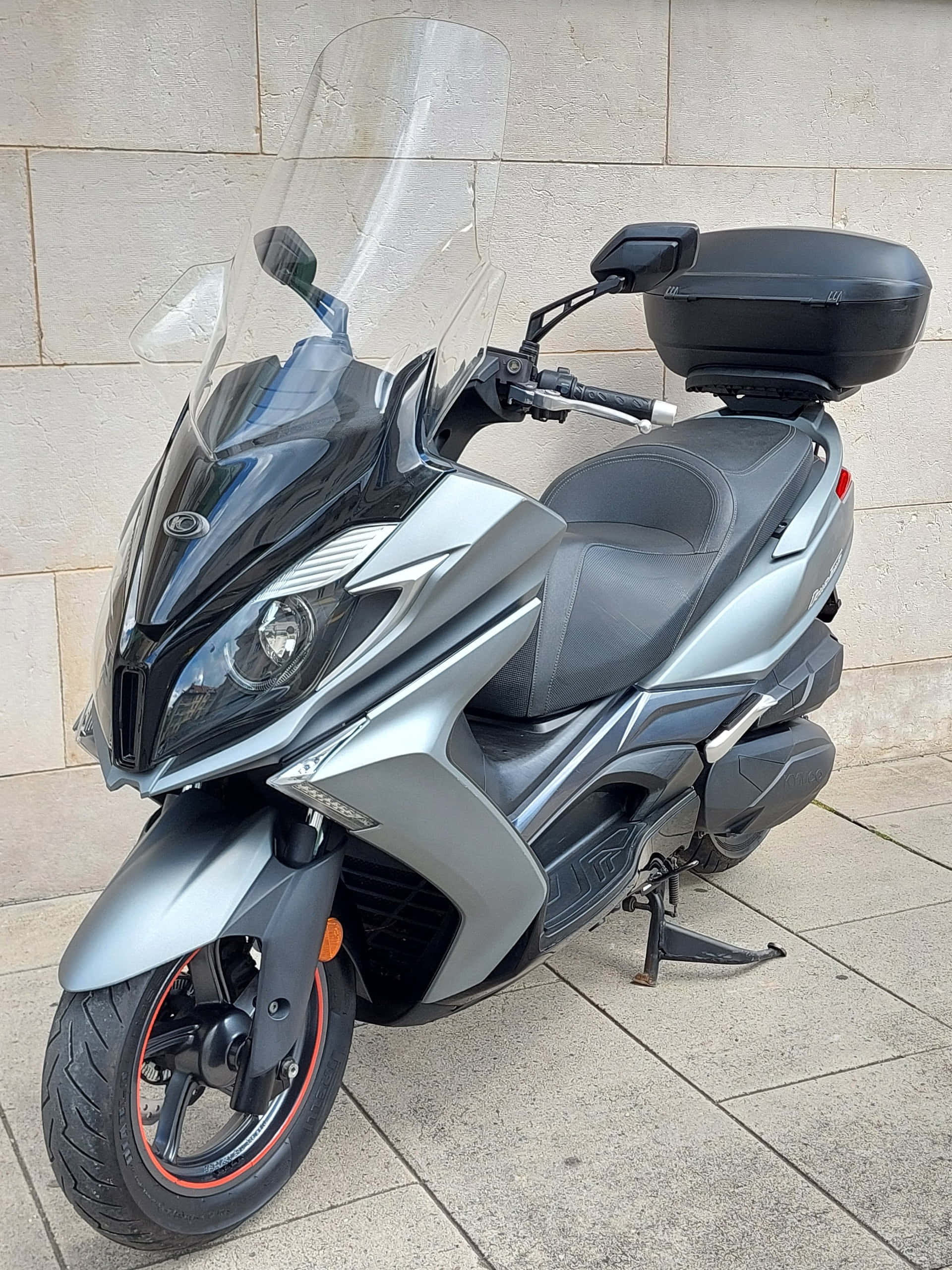 Kymco, sleek silver scooter, tall clear windshield, 2K Phone Wallpaper