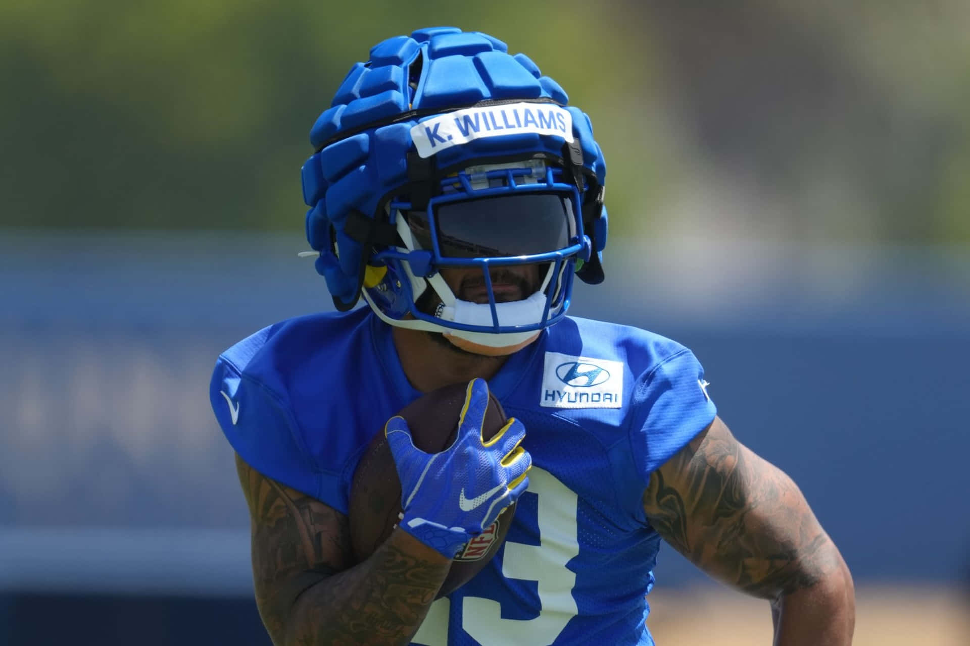 Kyren Williams, blue uniform, helmet, Full HD Desktop Wallpaper