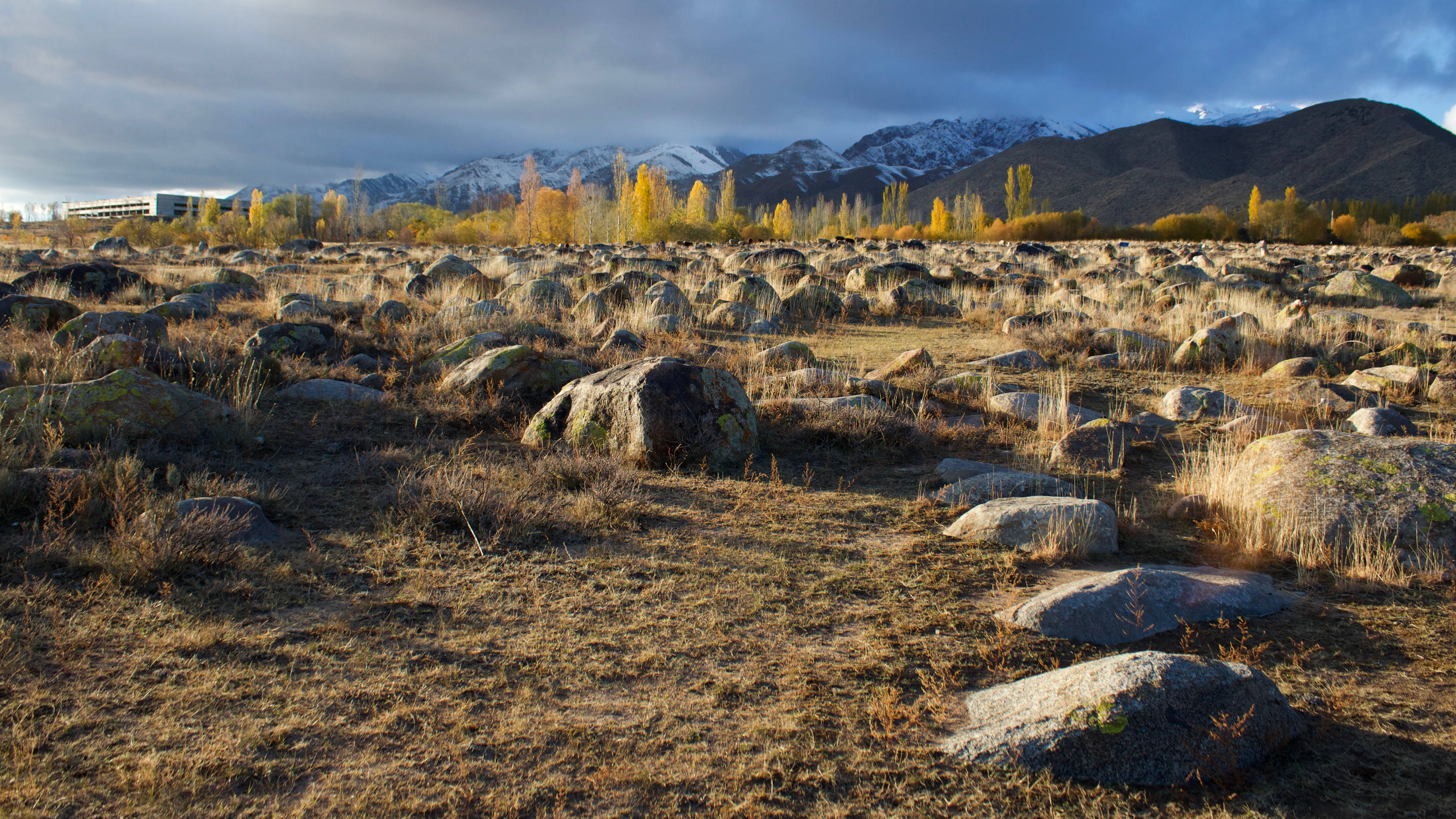Kyrgyzstan, rocky mountain region, dry grass, 4K Desktop Wallpaper