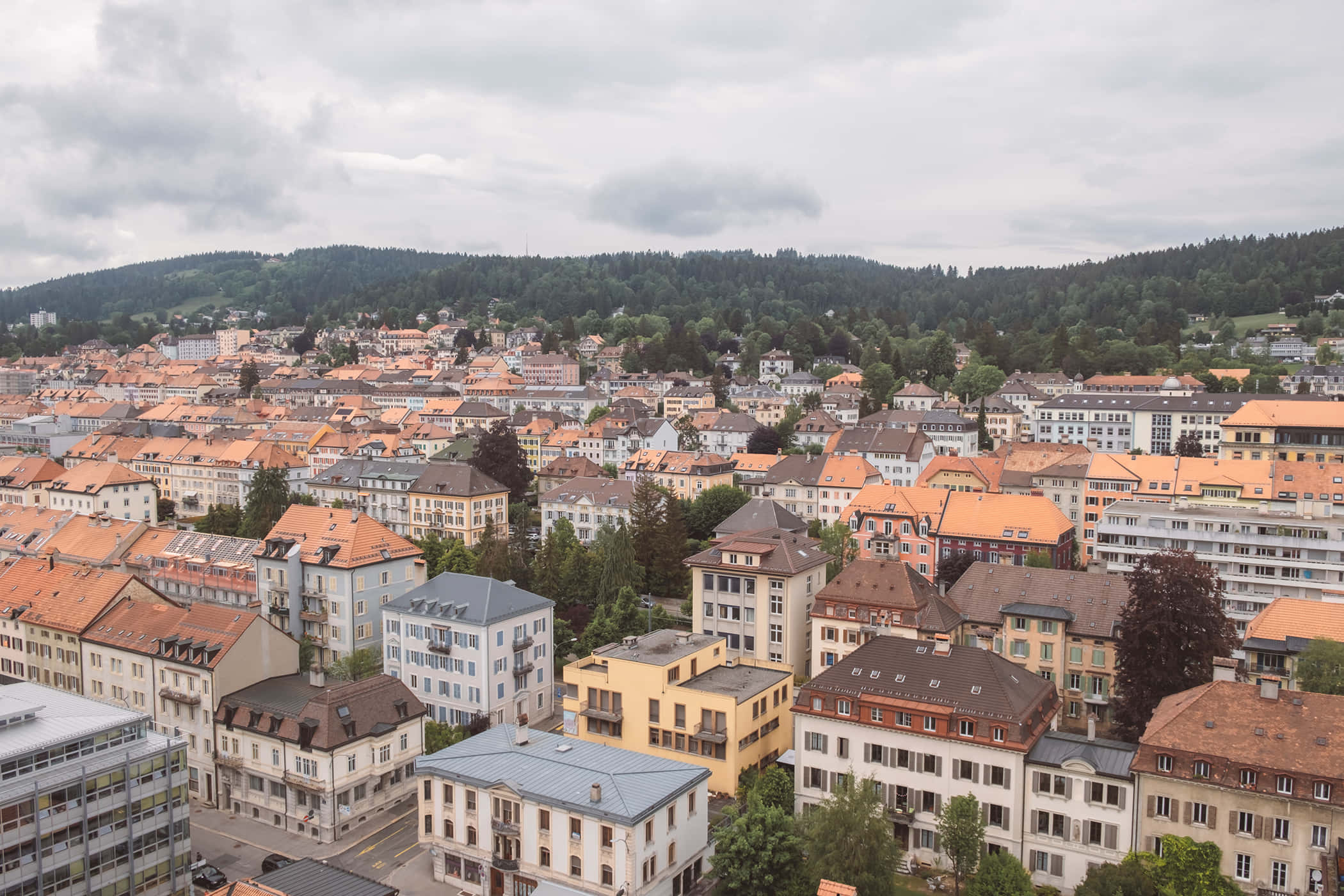 La Chaux De Fonds, terracotta roofs, green hills, Full HD Desktop Wallpaper