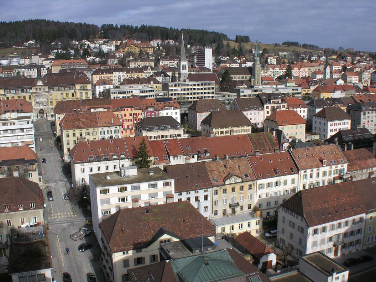 La Chaux De Fonds, red-tiled roofs, church spires, SD Desktop Wallpaper