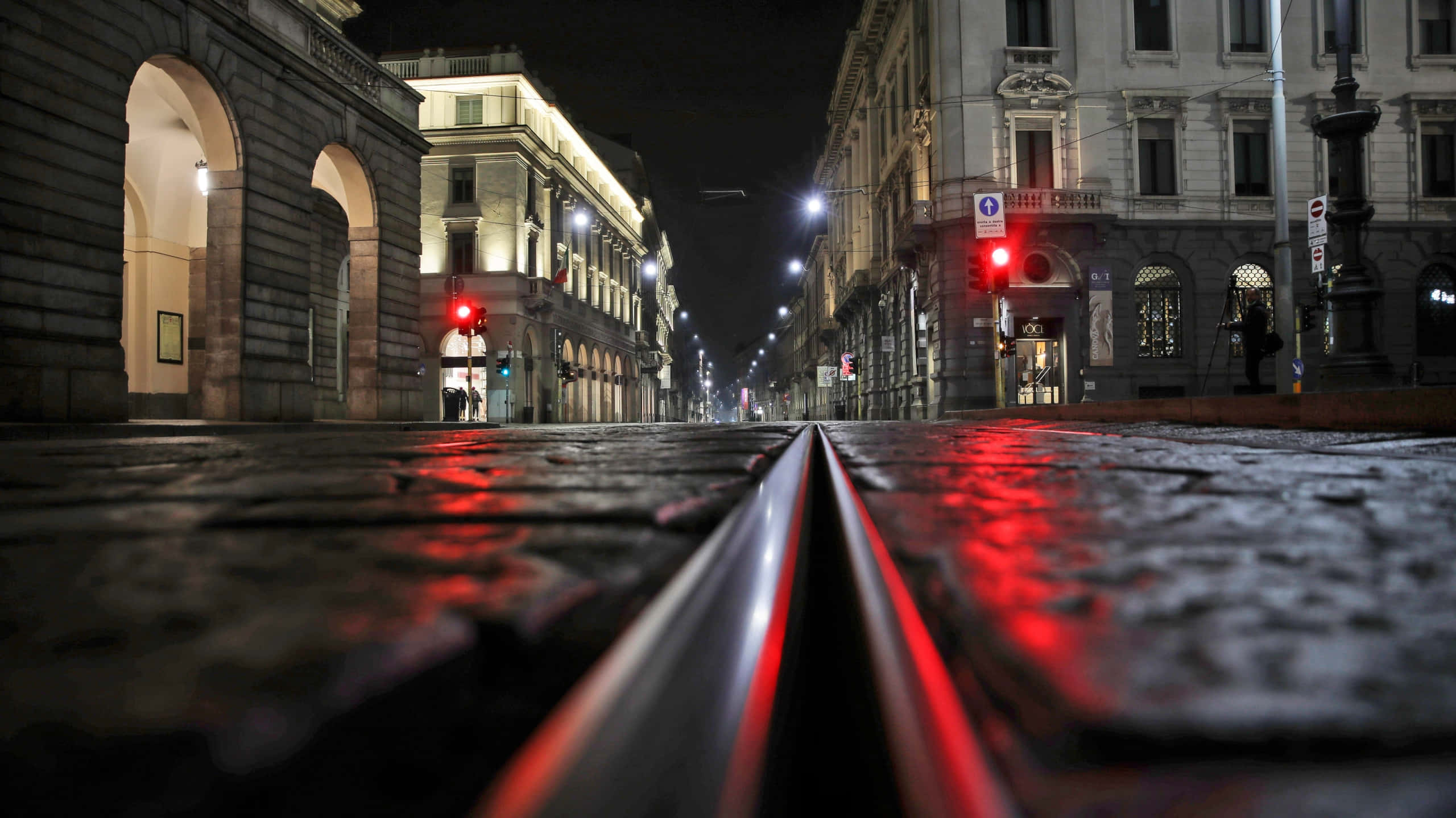 La Scala Opera House, wet cobblestone street, tram rails, 2K Desktop Wallpaper