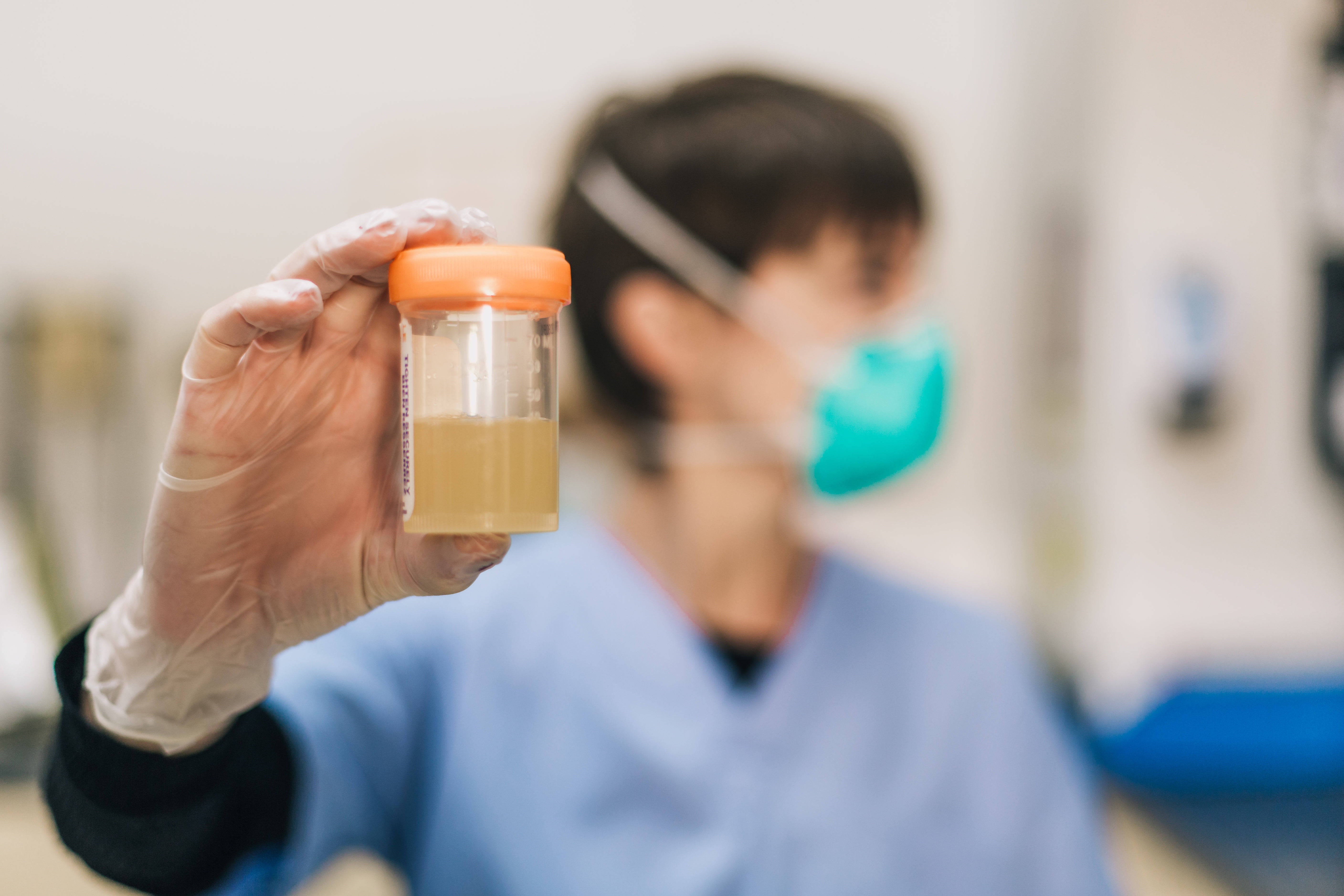 urine laboratory test sample, cup, gloved hand, 5K Desktop Wallpaper