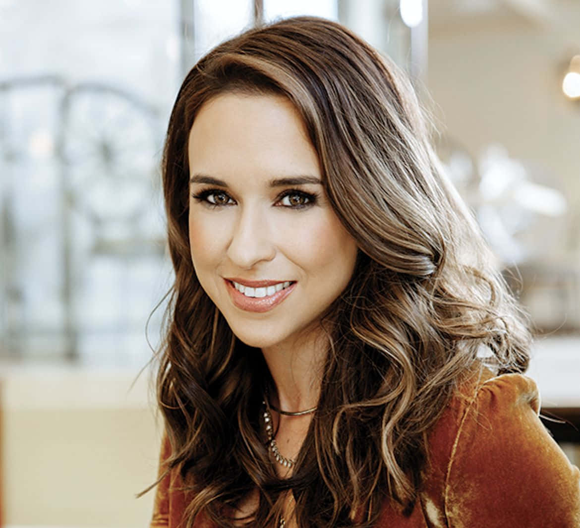 Lacey Chabert, rust-colored top, wavy brown hair, SD Desktop Wallpaper