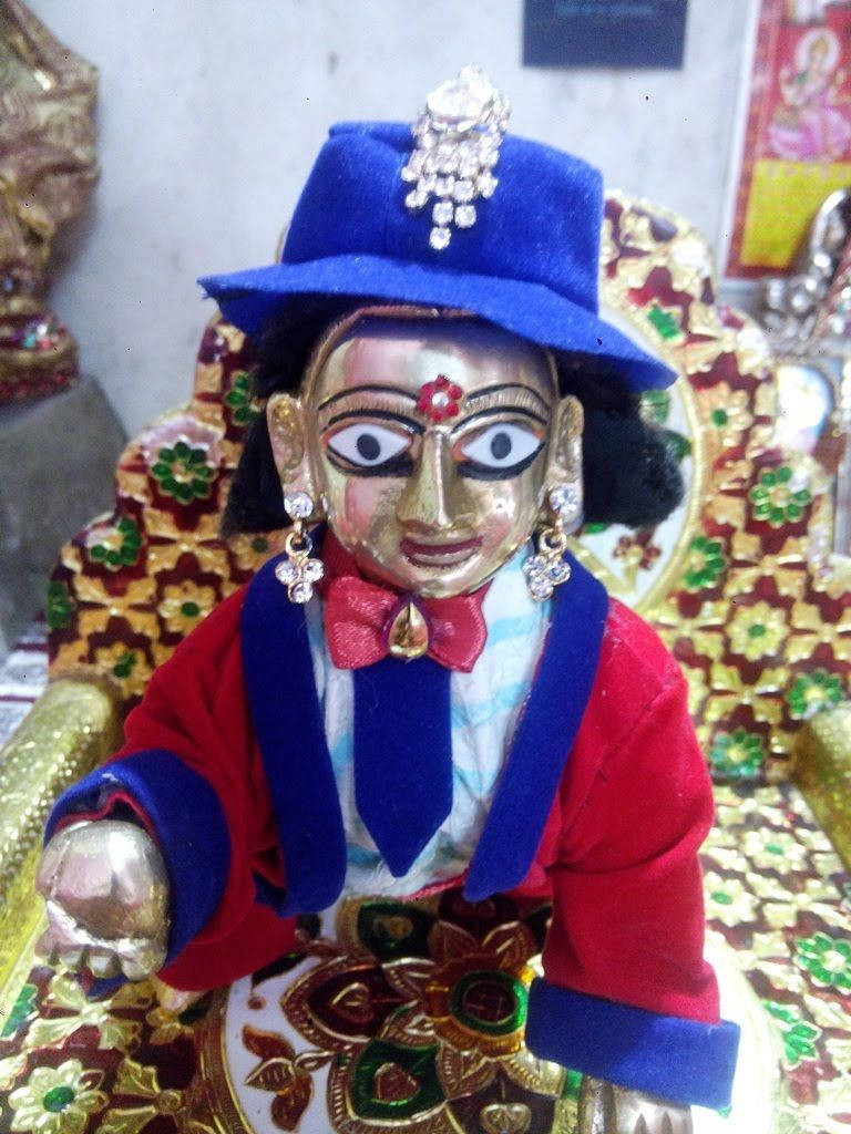 Laddu Gopal, golden-faced, blue hat, SD Phone Wallpaper