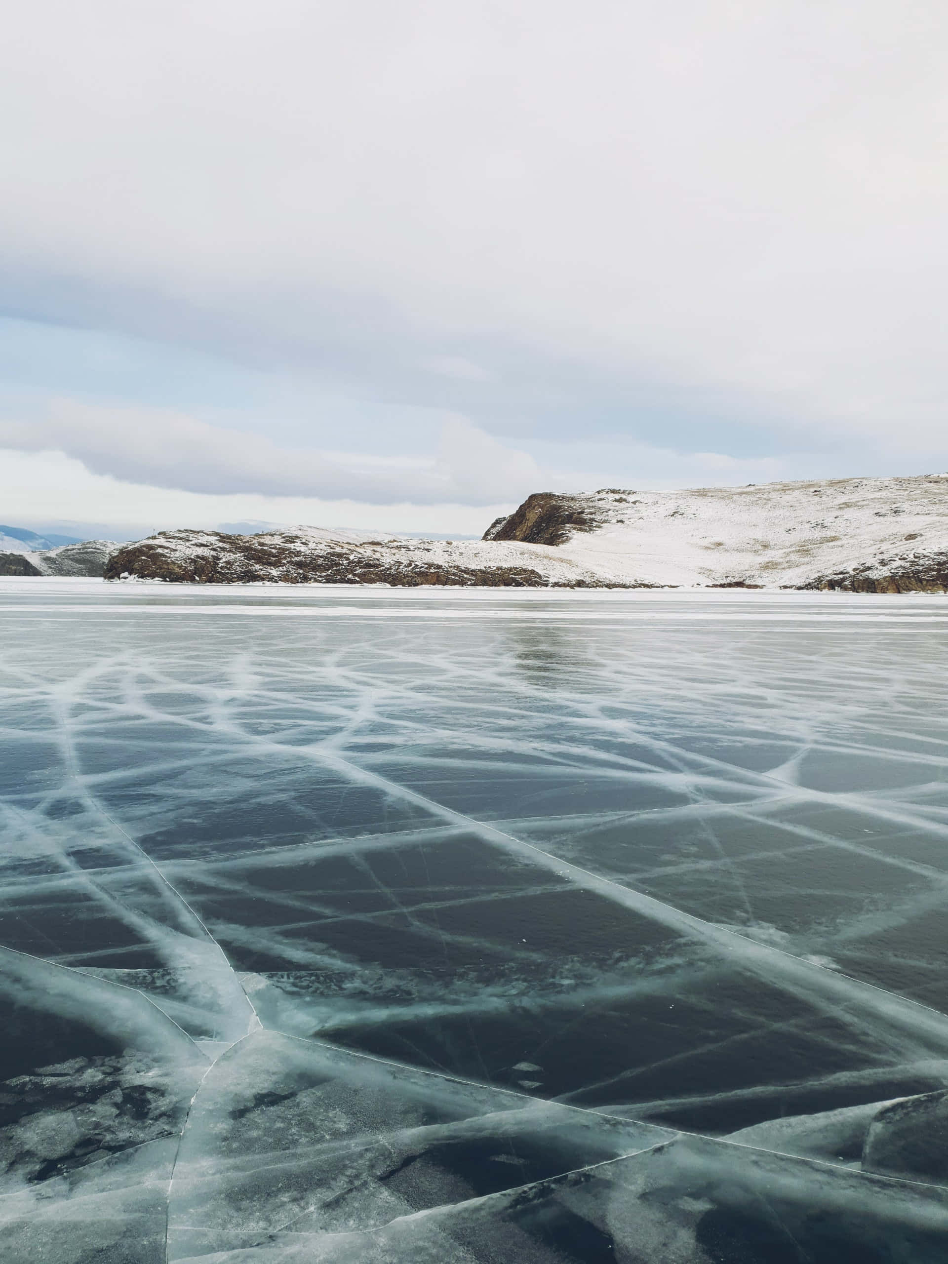 Lake Baikal, frozen lake, intricate ice cracks, 2K Phone Wallpaper