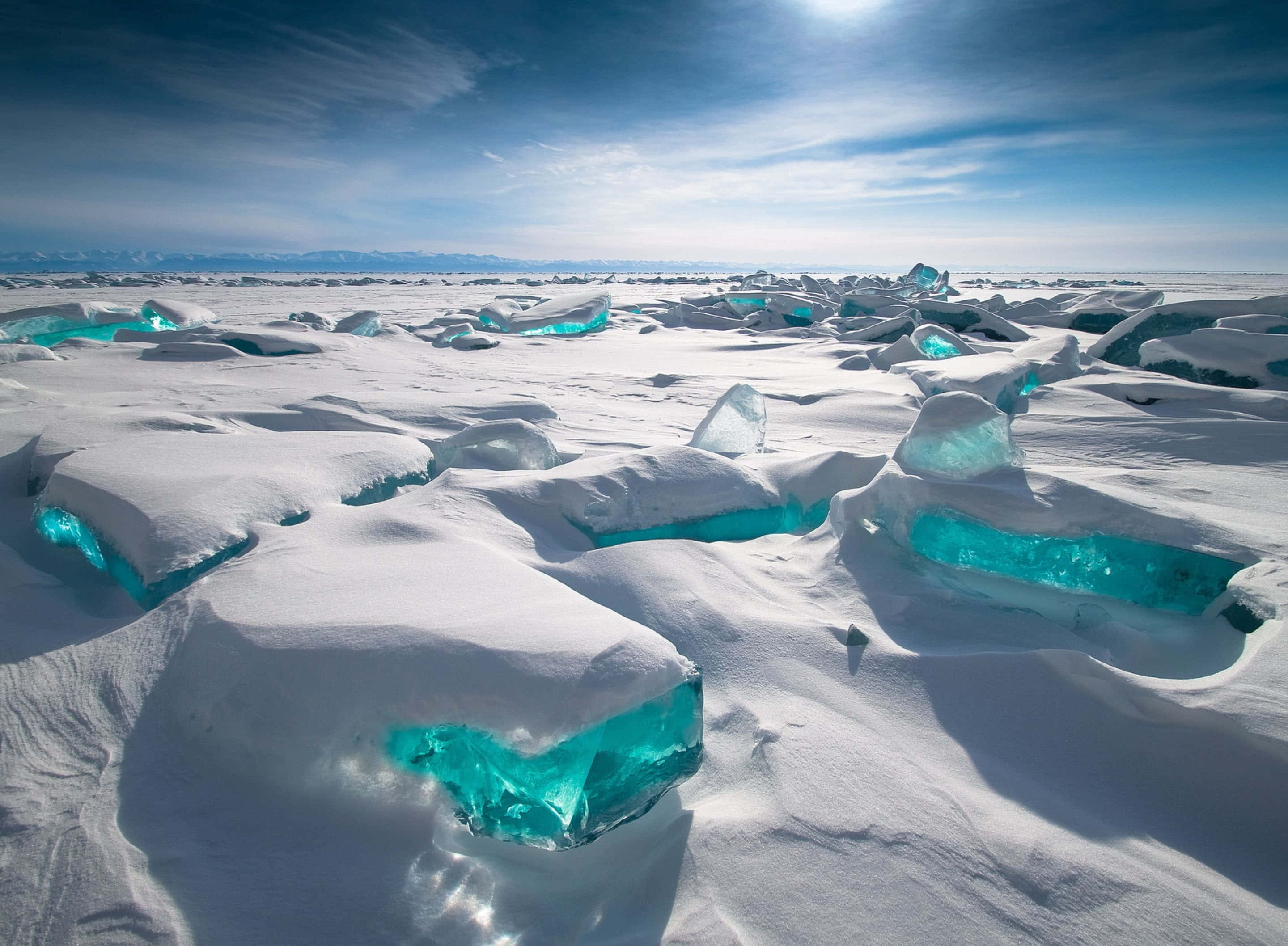 Lake Baikal, turquoise ice, pristine snow, 2K Desktop Wallpaper