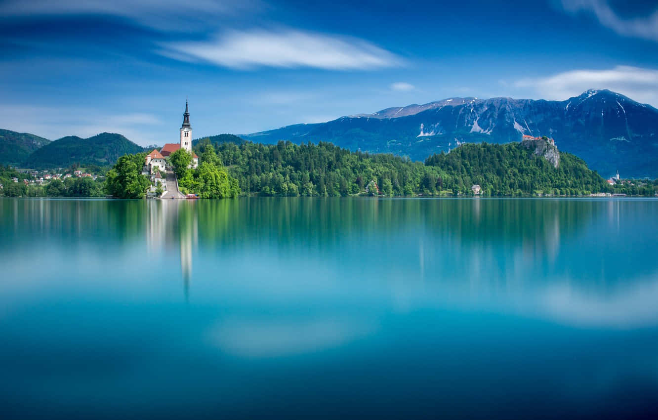 Lake Bled, church on a lush island, snow-capped mountains, HD Desktop Wallpaper
