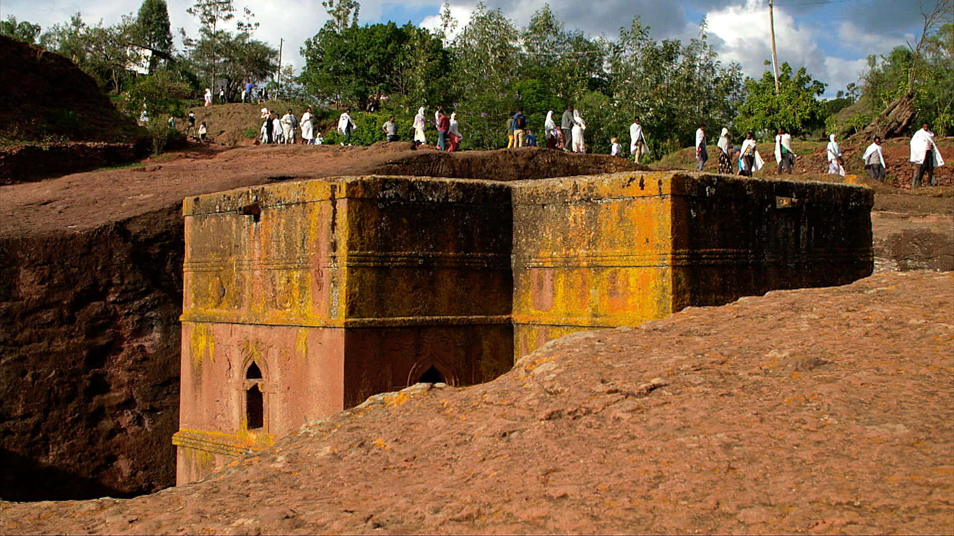 Lalibela, rock-hewn churches, vibrant orange lichen, Full HD Desktop Wallpaper