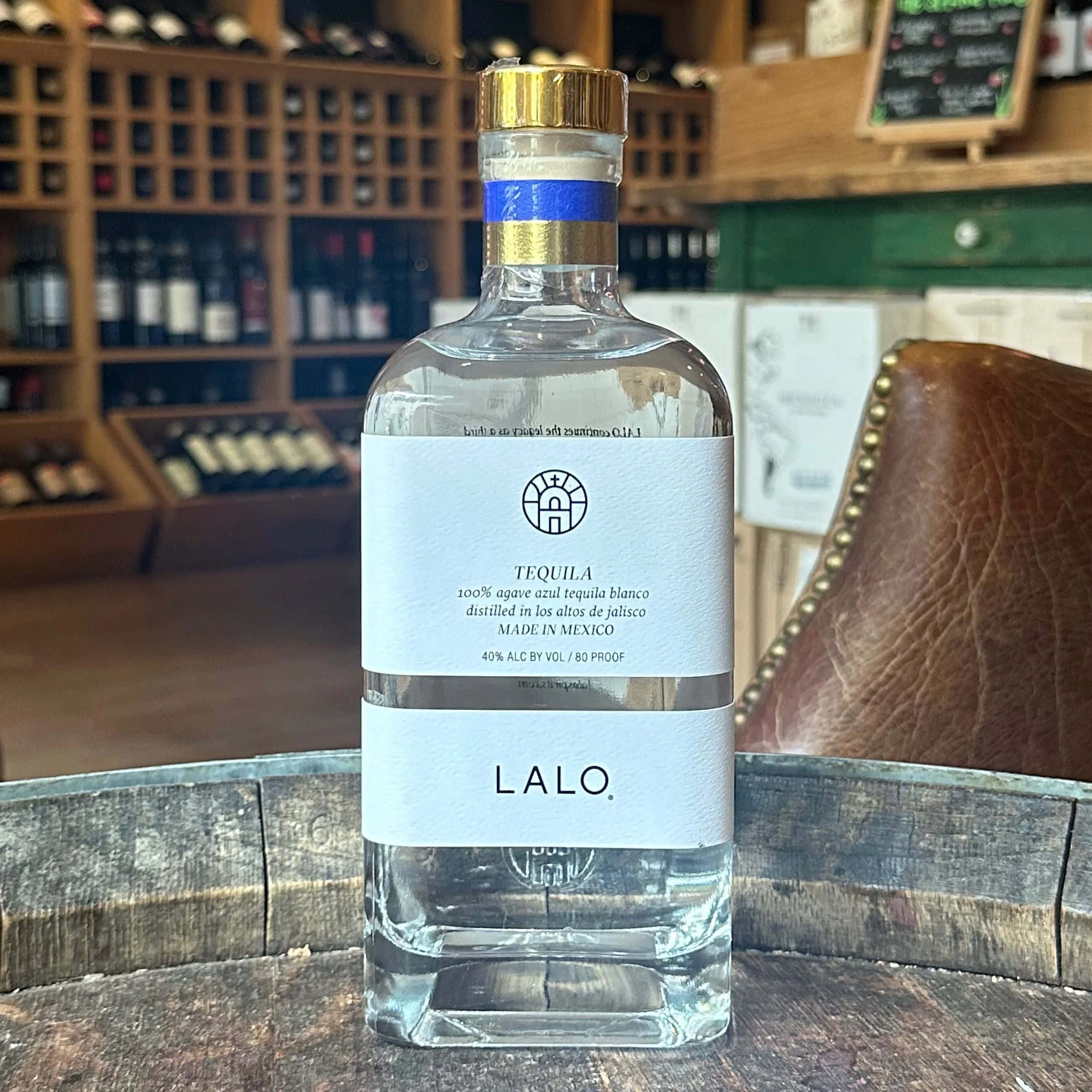 Lalo Tequila, clear bottle, gold cap, 2K Desktop Wallpaper