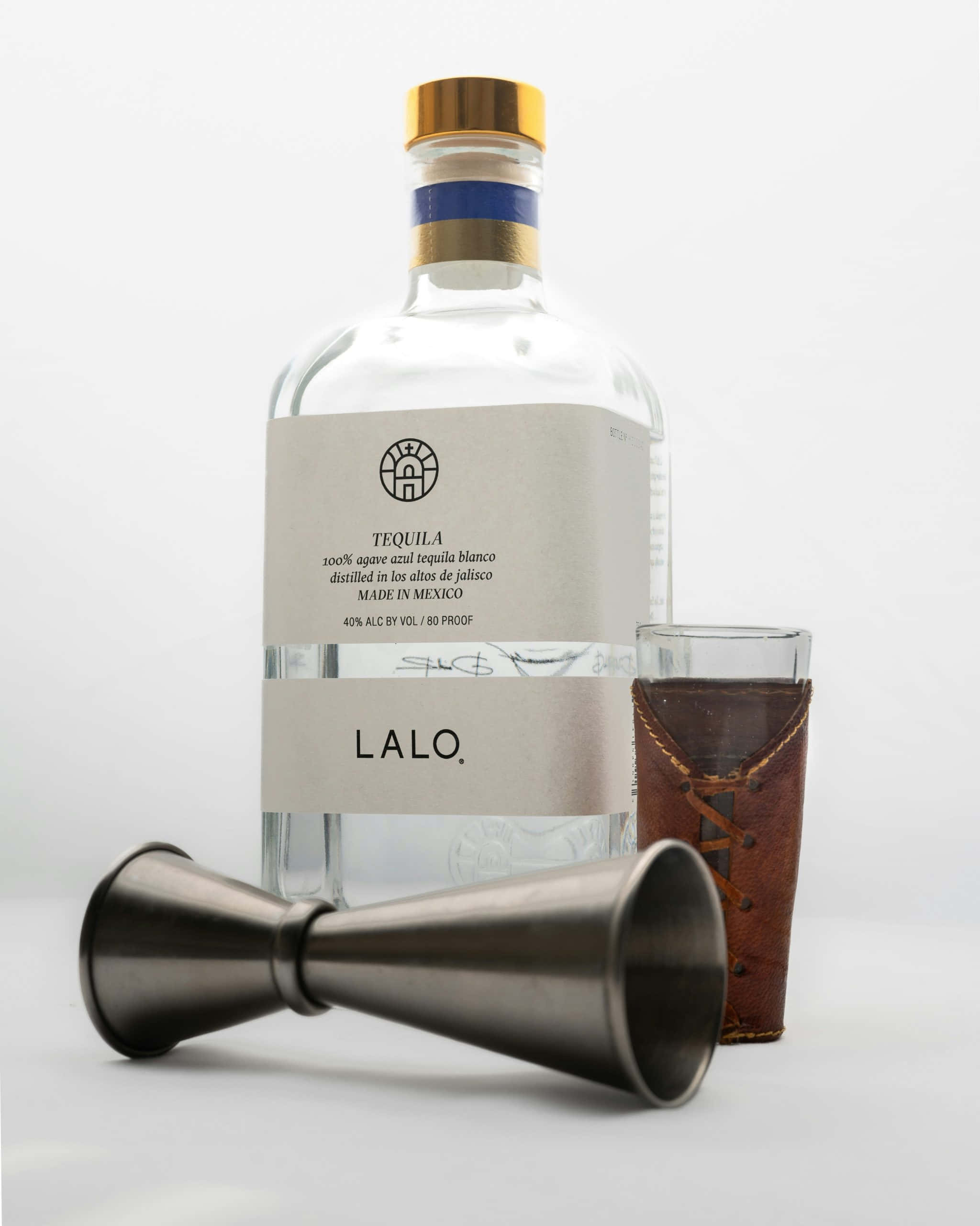 Lalo Tequila, gold cap, leather-wrapped glass, 2K Phone Wallpaper