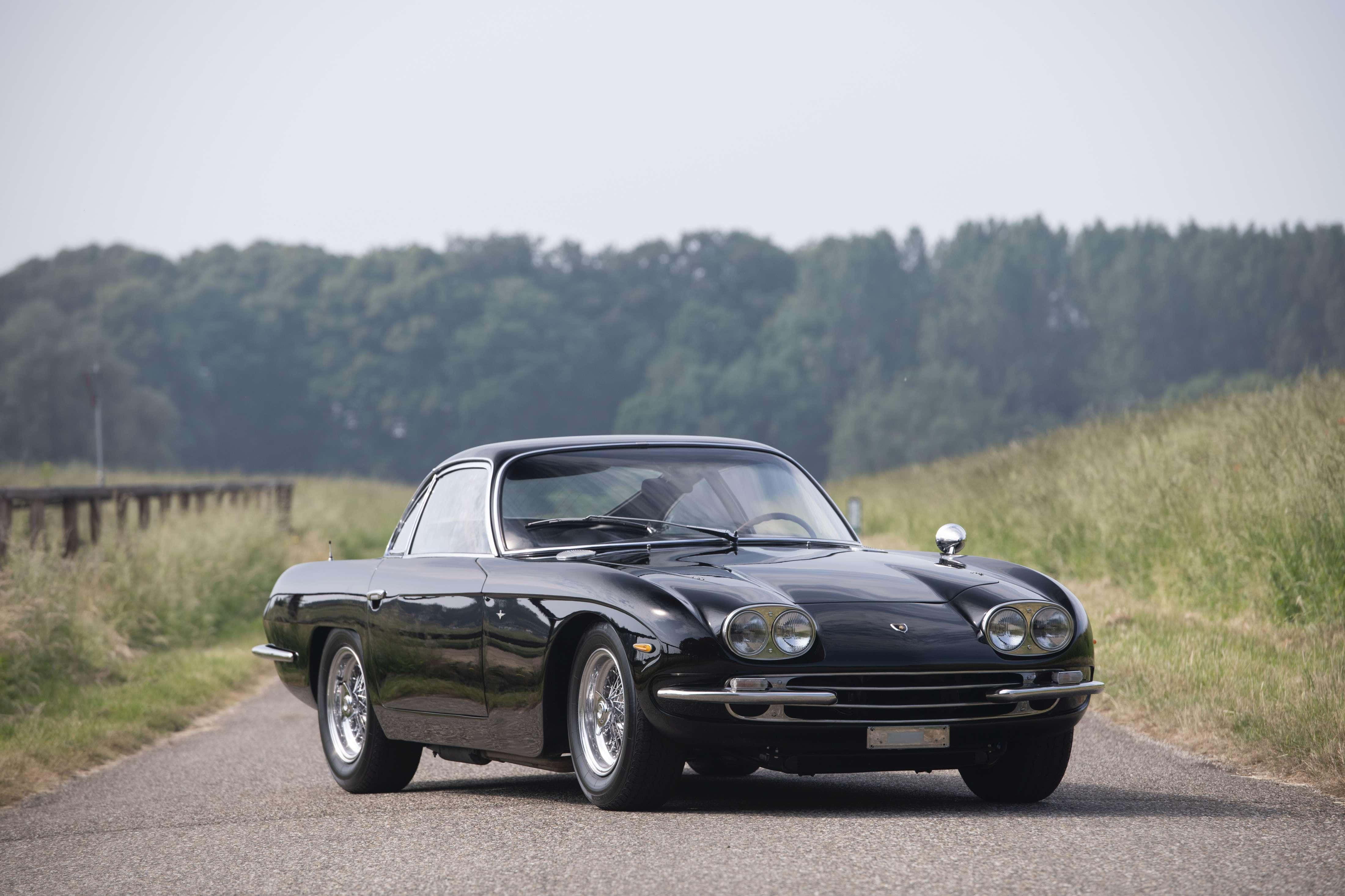 Lamborghini 400 GT, sleek black classic sports car, rural road, 4K Desktop Wallpaper