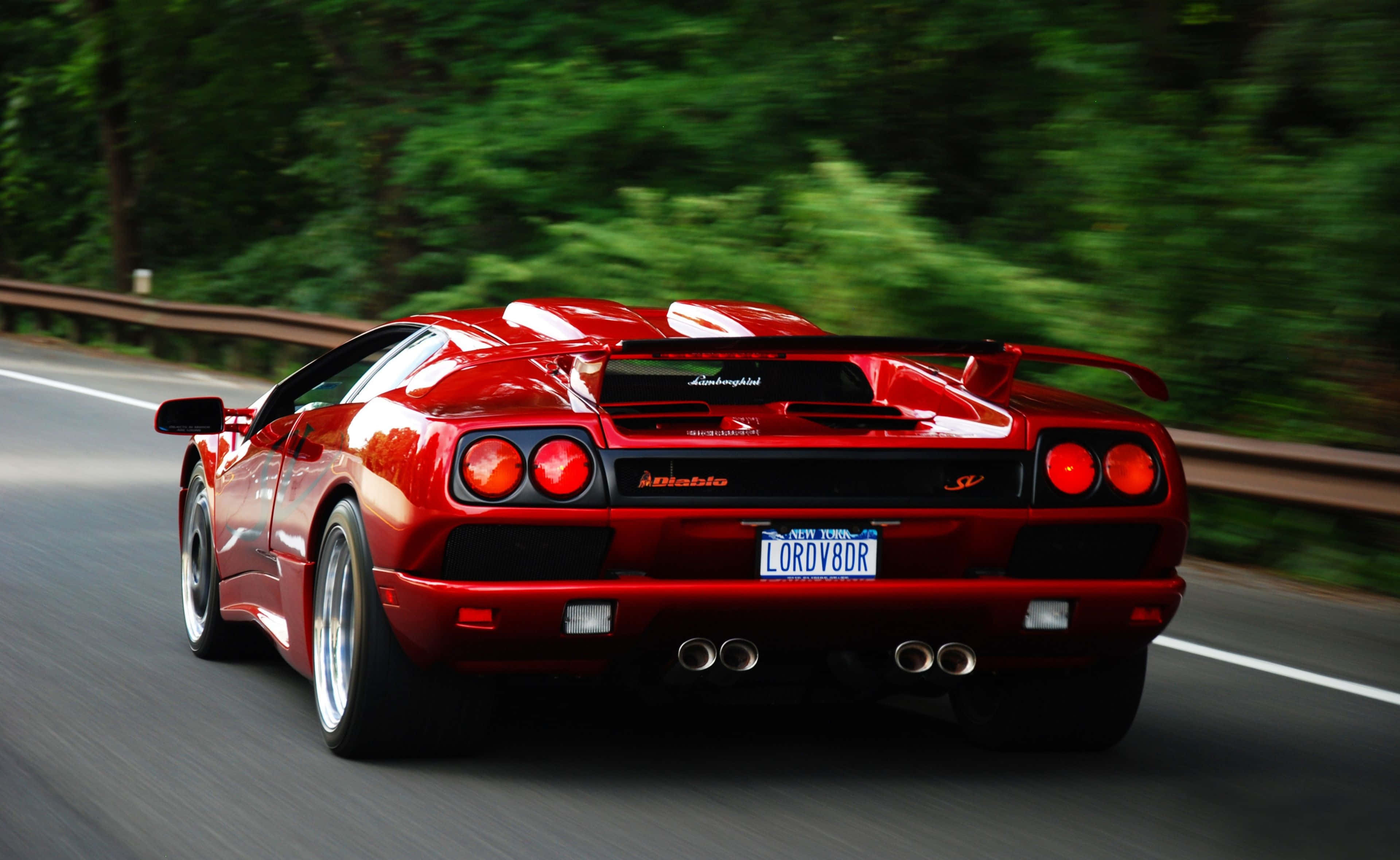 Lamborghini Diablo, vibrant red, forest-lined road, 4K Desktop Wallpaper