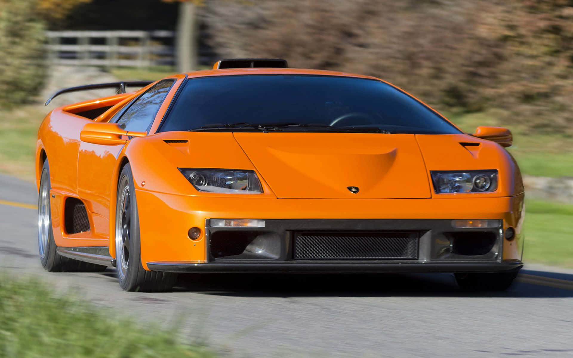 Lamborghini Diablo, vibrant orange, winding road, Full HD Desktop Wallpaper