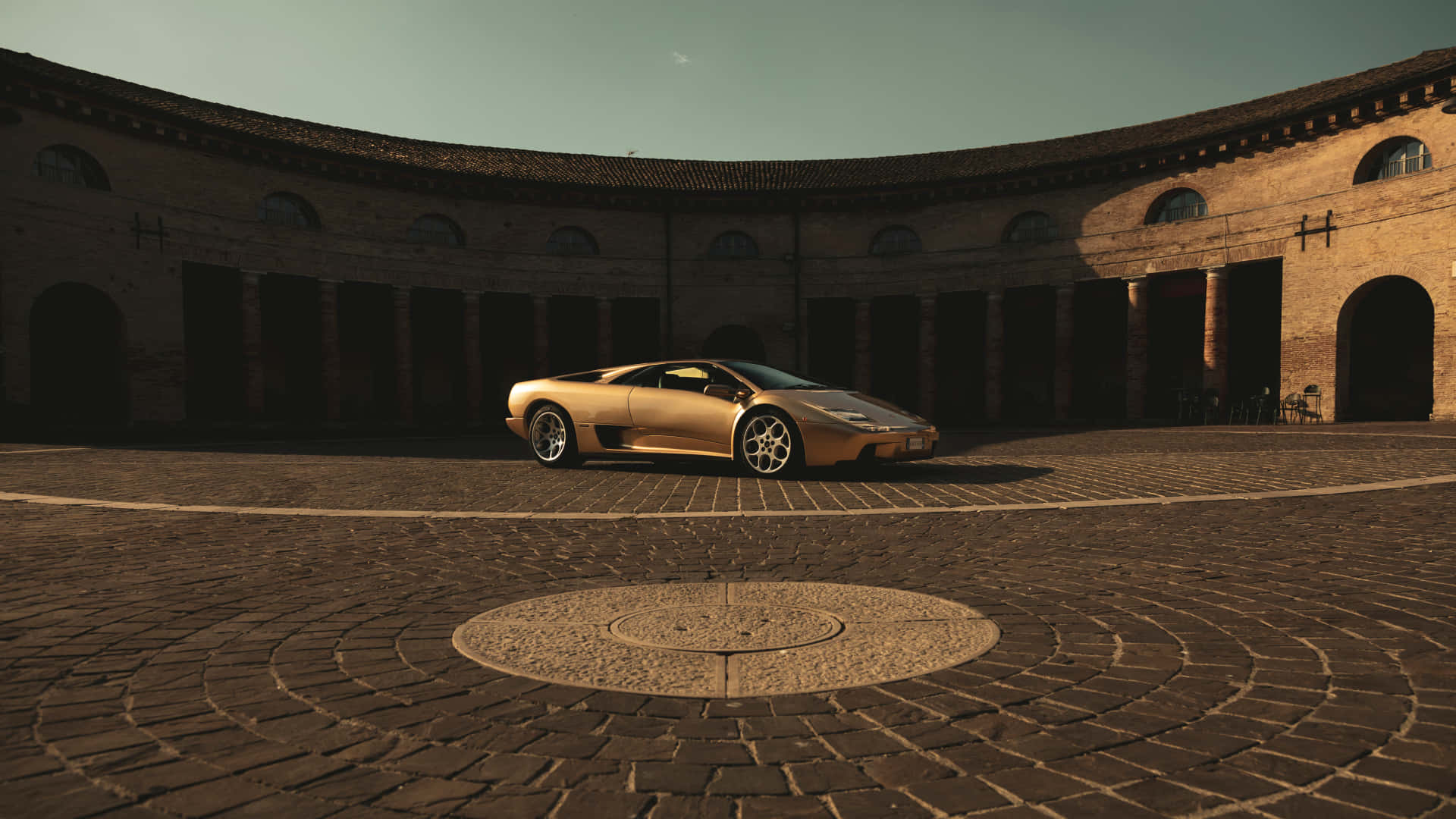 Lamborghini Diablo, golden, sunlit cobblestone courtyard, Full HD Desktop Wallpaper