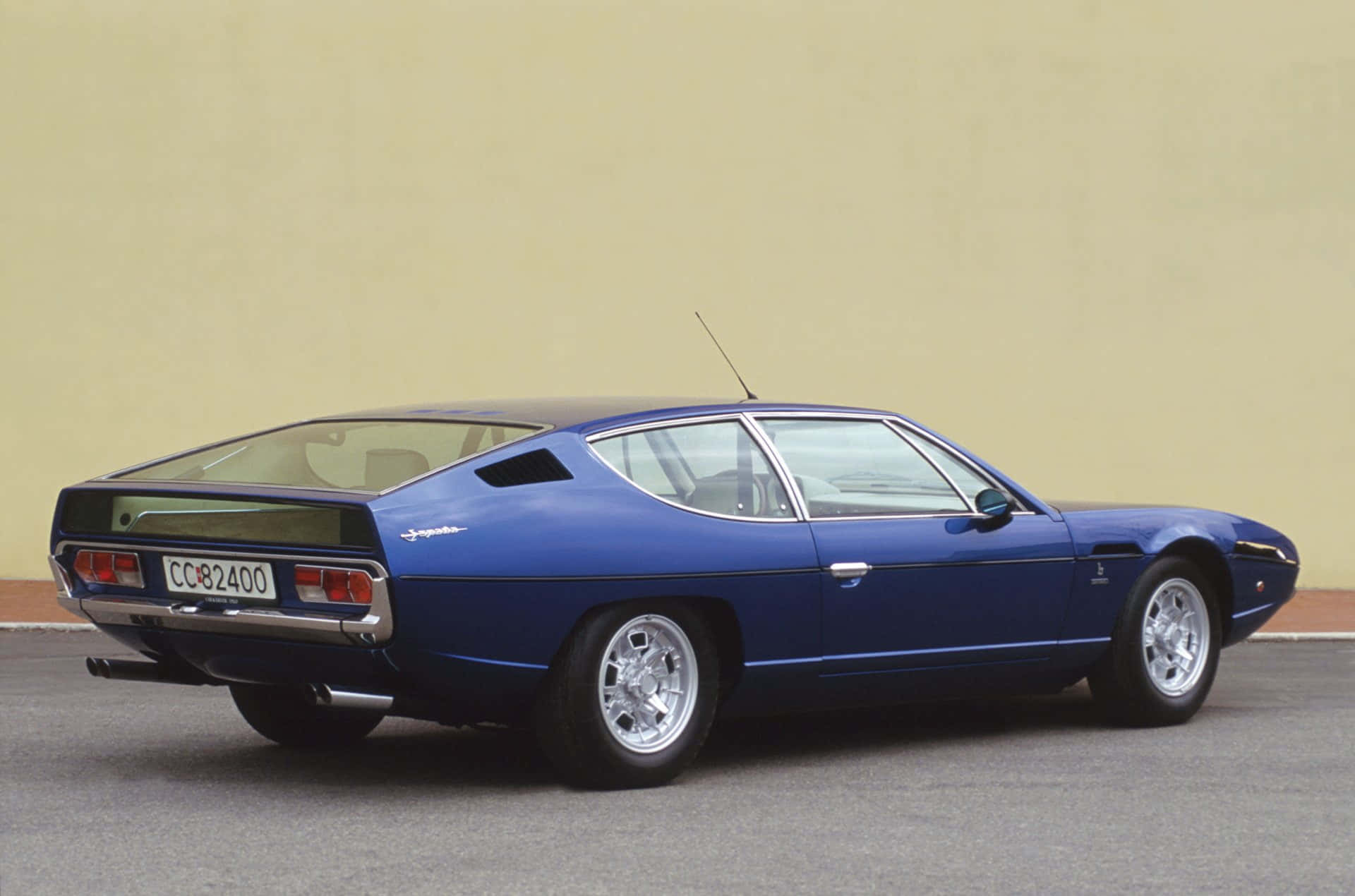 Lamborghini Espada, sleek blue classic sports car, plain beige wall, Full HD Desktop Wallpaper
