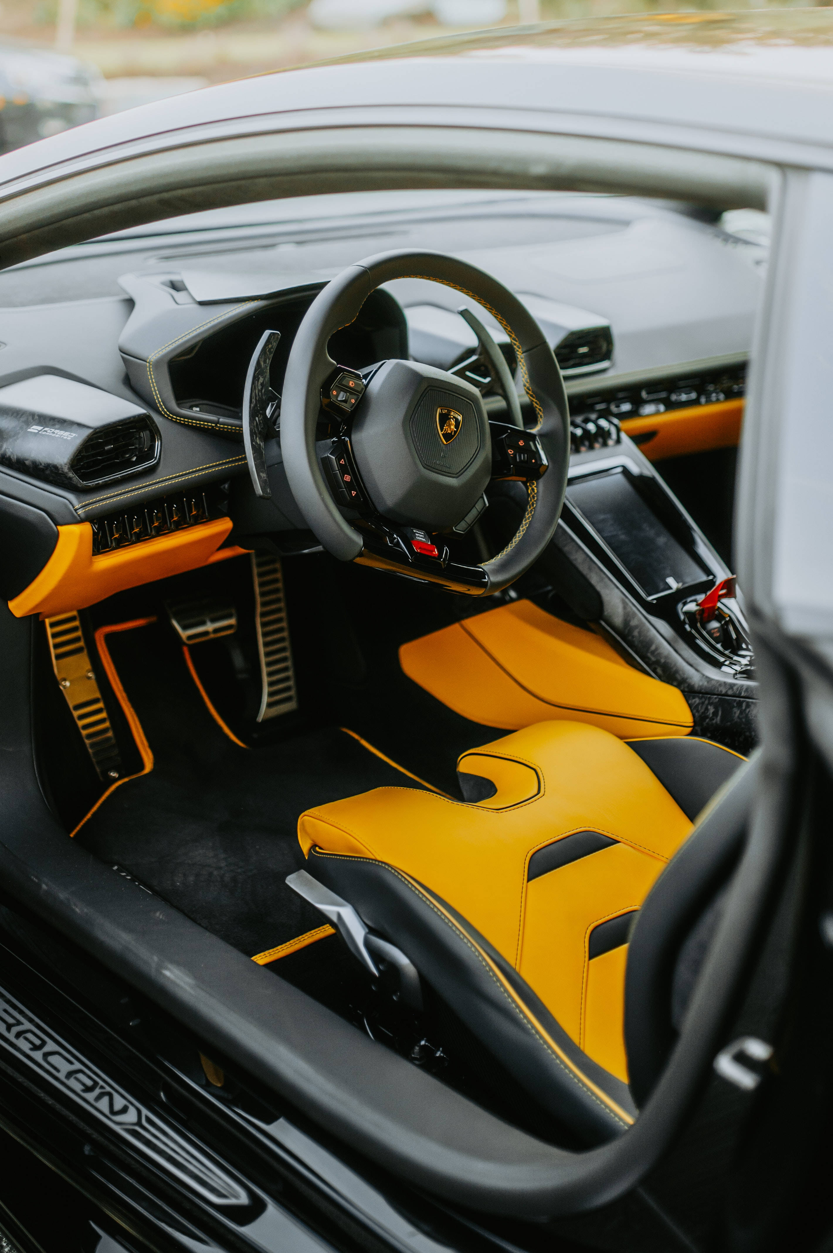 Lamborghini Galaxy, orange interior, black and vibrant yellow interior, 4K Phone Wallpaper
