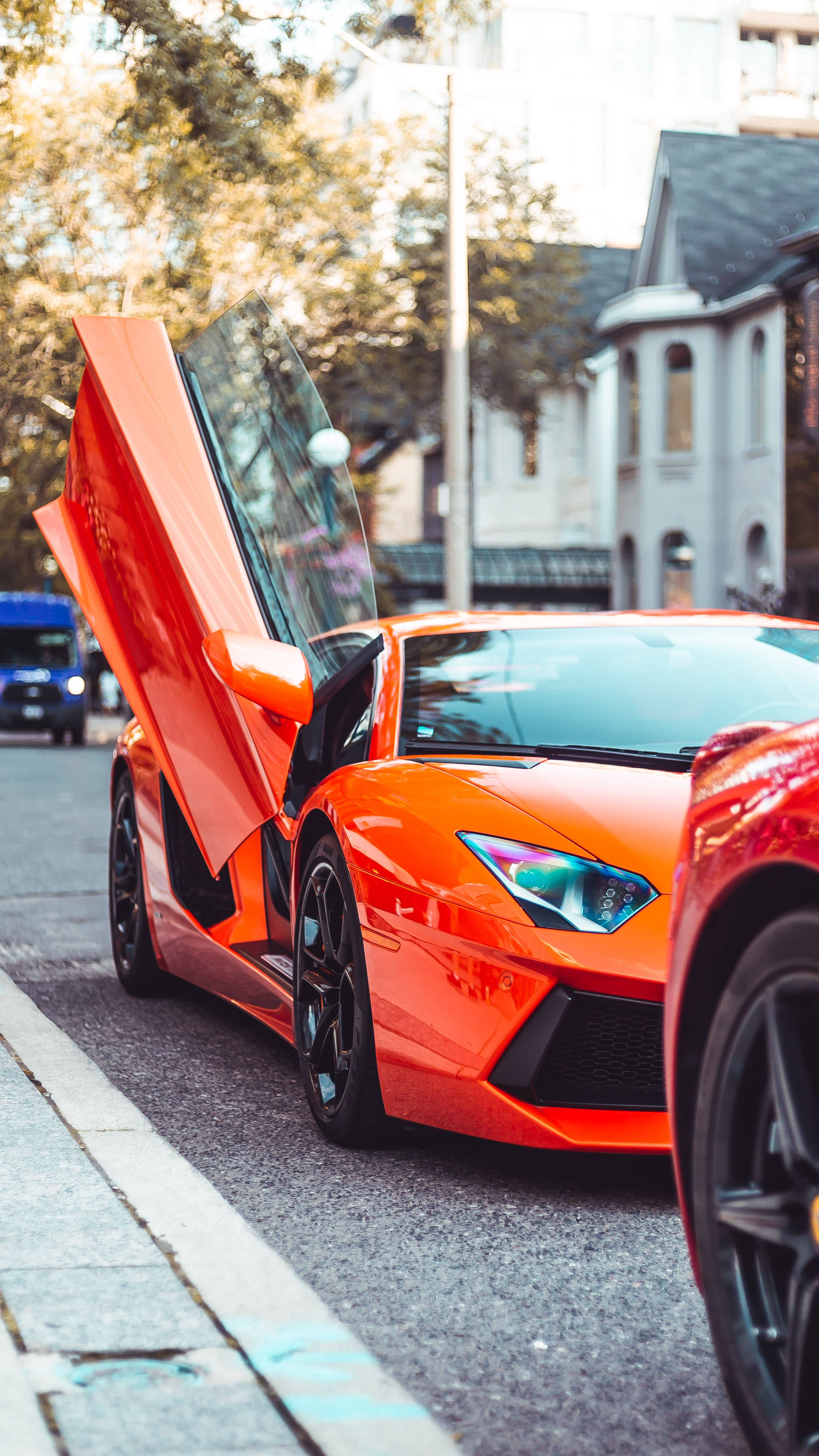 Lamborghini Galaxy, scissor doors, vibrant orange, 4K Phone Wallpaper