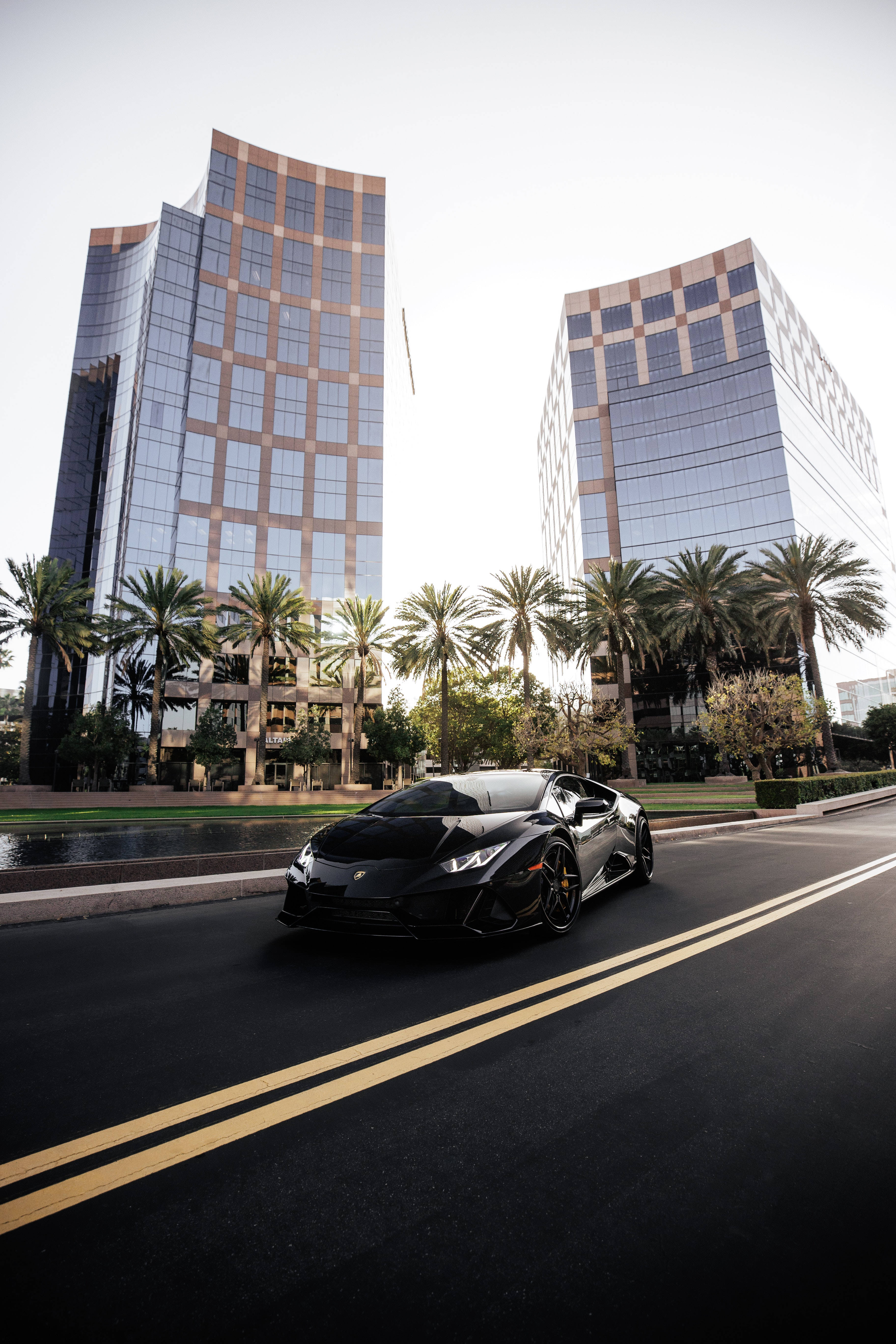 Lamborghini Galaxy, cityscape, sleek black sports car, 5K Phone Wallpaper