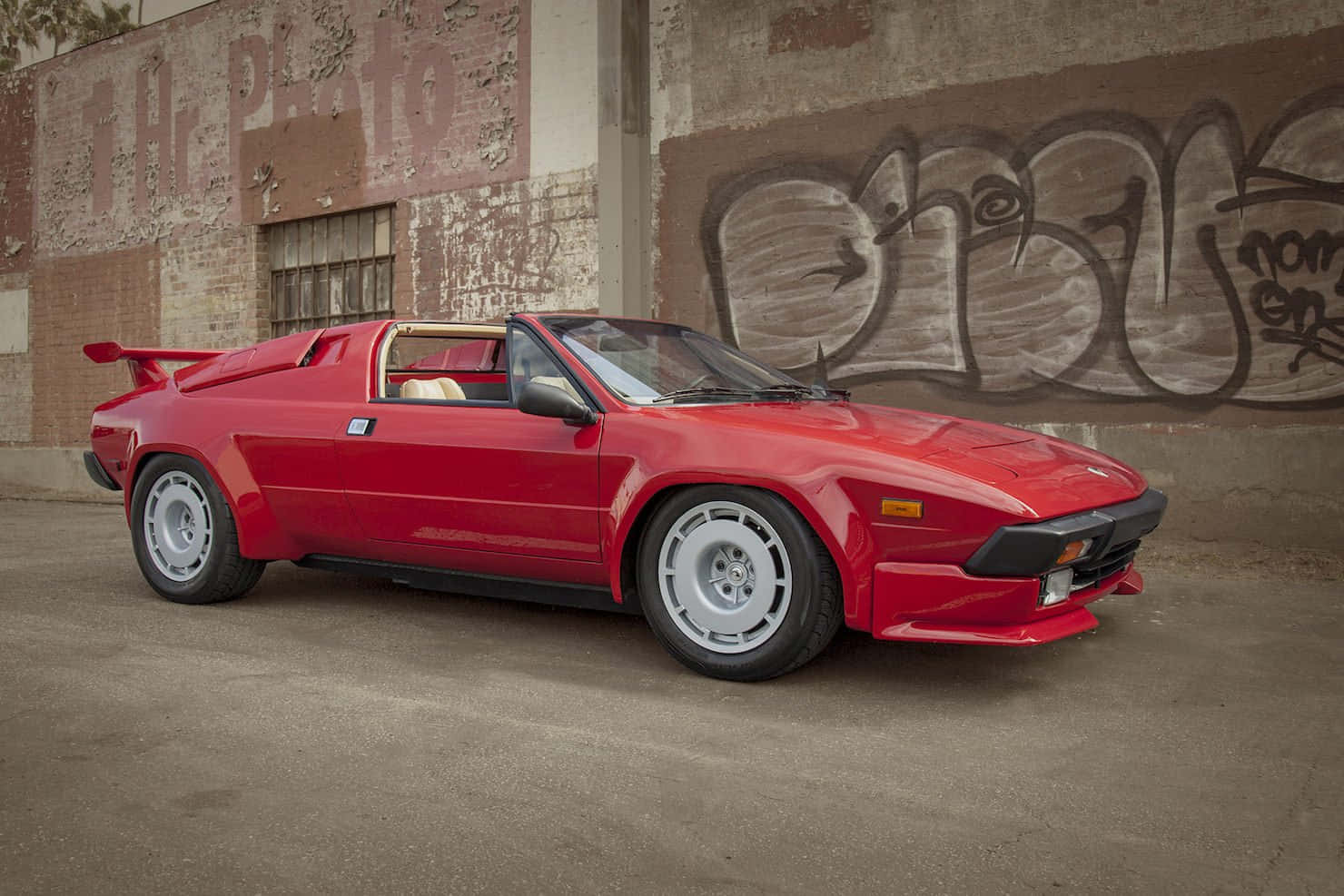 Lamborghini Jalpa, vibrant red, graffiti-covered urban wall, HD Desktop Wallpaper