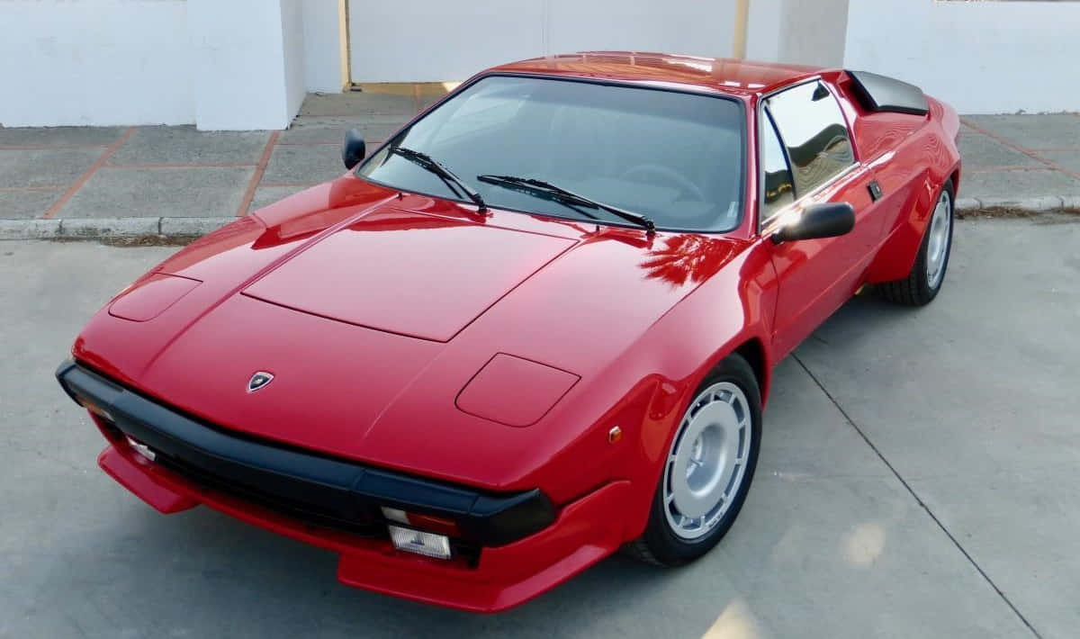 Lamborghini Jalpa, glossy red, concrete lot, SD Desktop Wallpaper