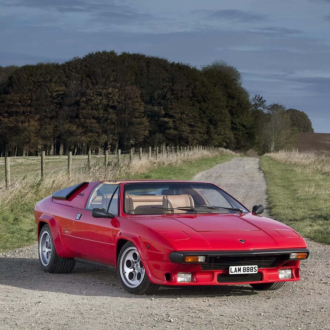 Lamborghini Silhouette, vibrant red, gravel country road, SD Desktop Wallpaper