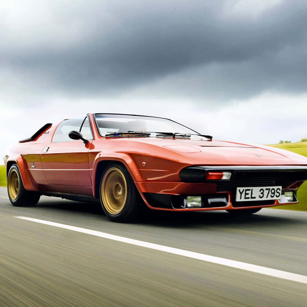 Lamborghini Silhouette, vibrant orange, cloudy sky, SD Desktop Wallpaper
