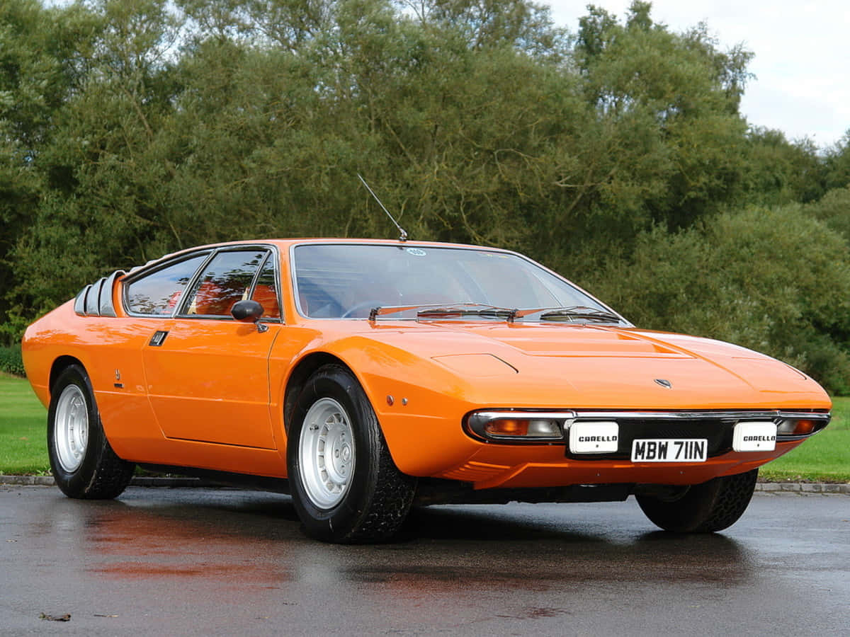 Lamborghini Urraco, vibrant orange, sleek lines, SD Desktop Wallpaper