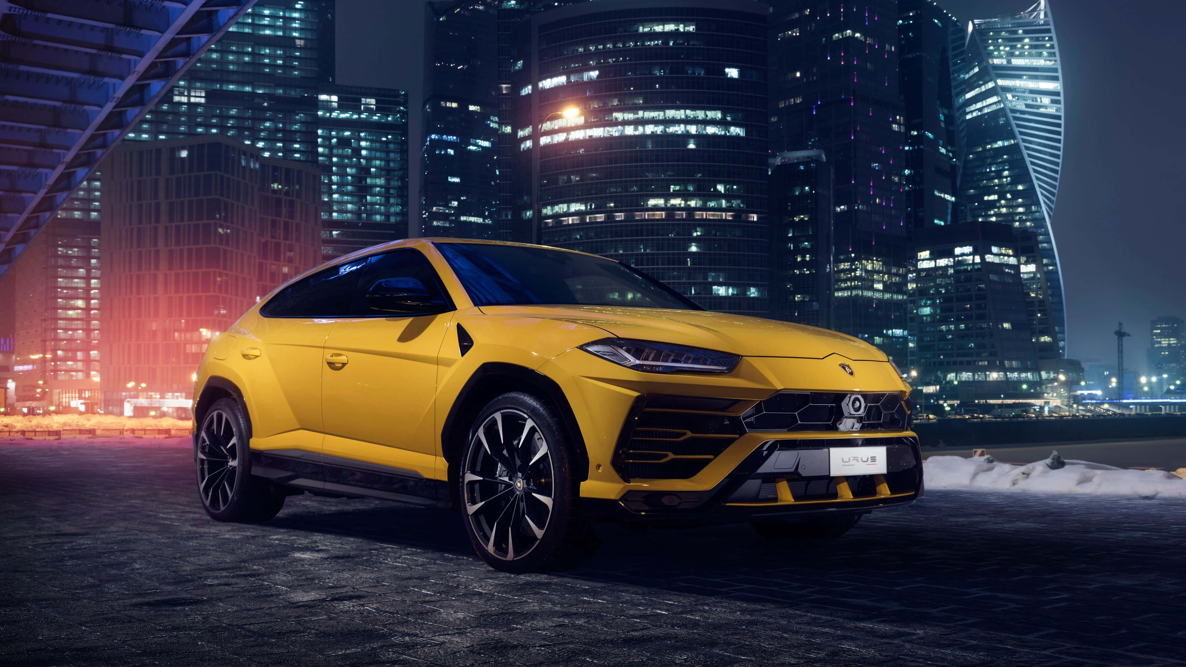 Lamborghini Urus, vibrant yellow, neon city lights, 4K Desktop Wallpaper