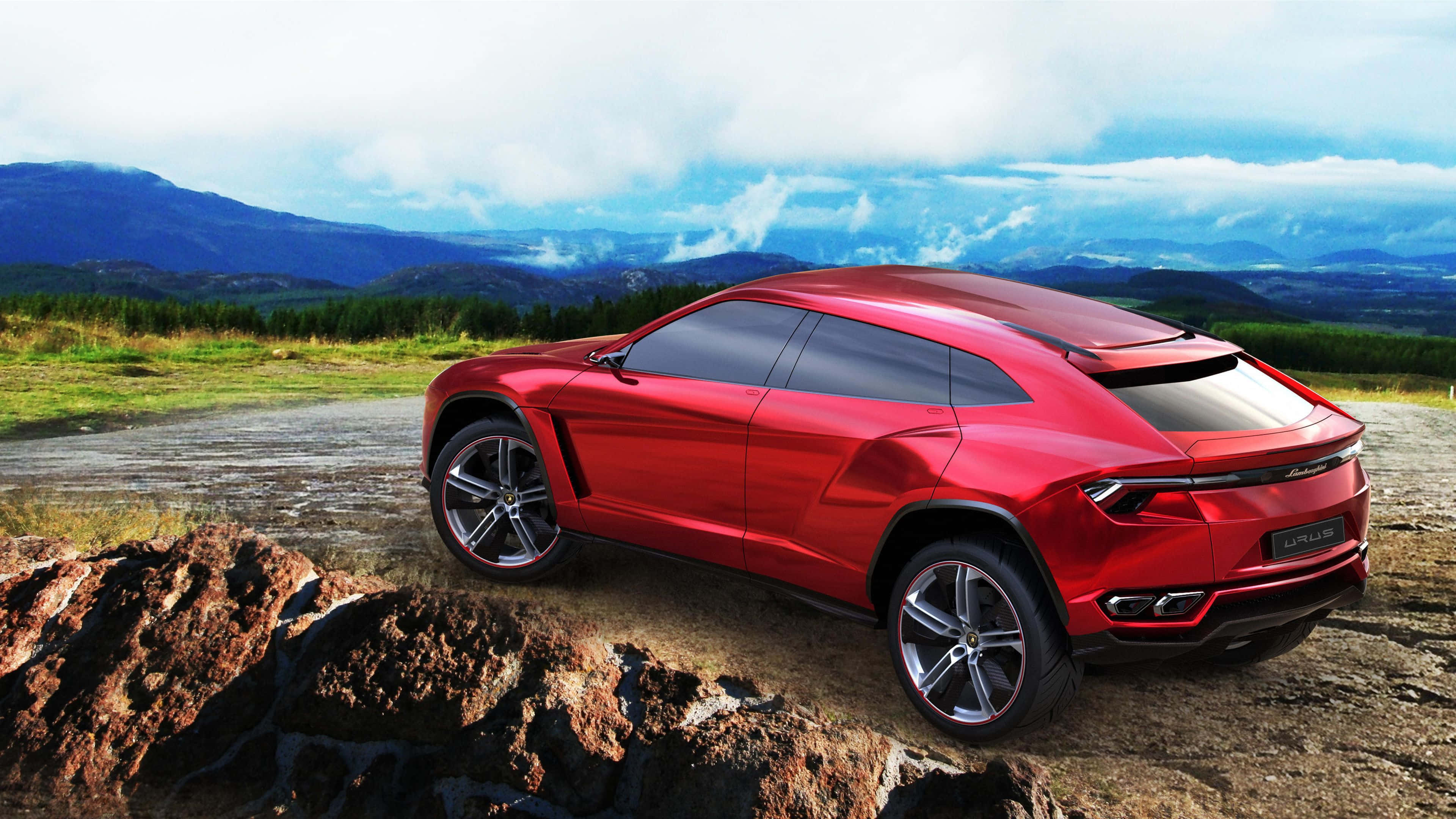 Lamborghini Urus, glossy red, rugged rocks, 4K Desktop Wallpaper