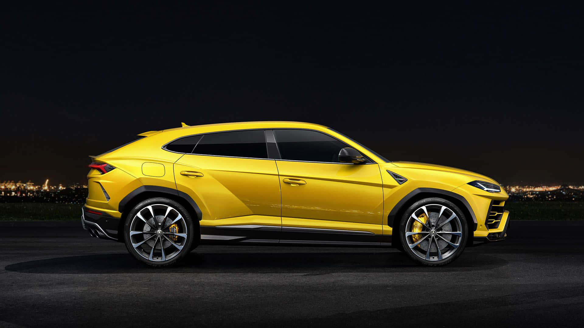 Lamborghini Urus, vibrant yellow, night lights, Full HD Desktop Wallpaper