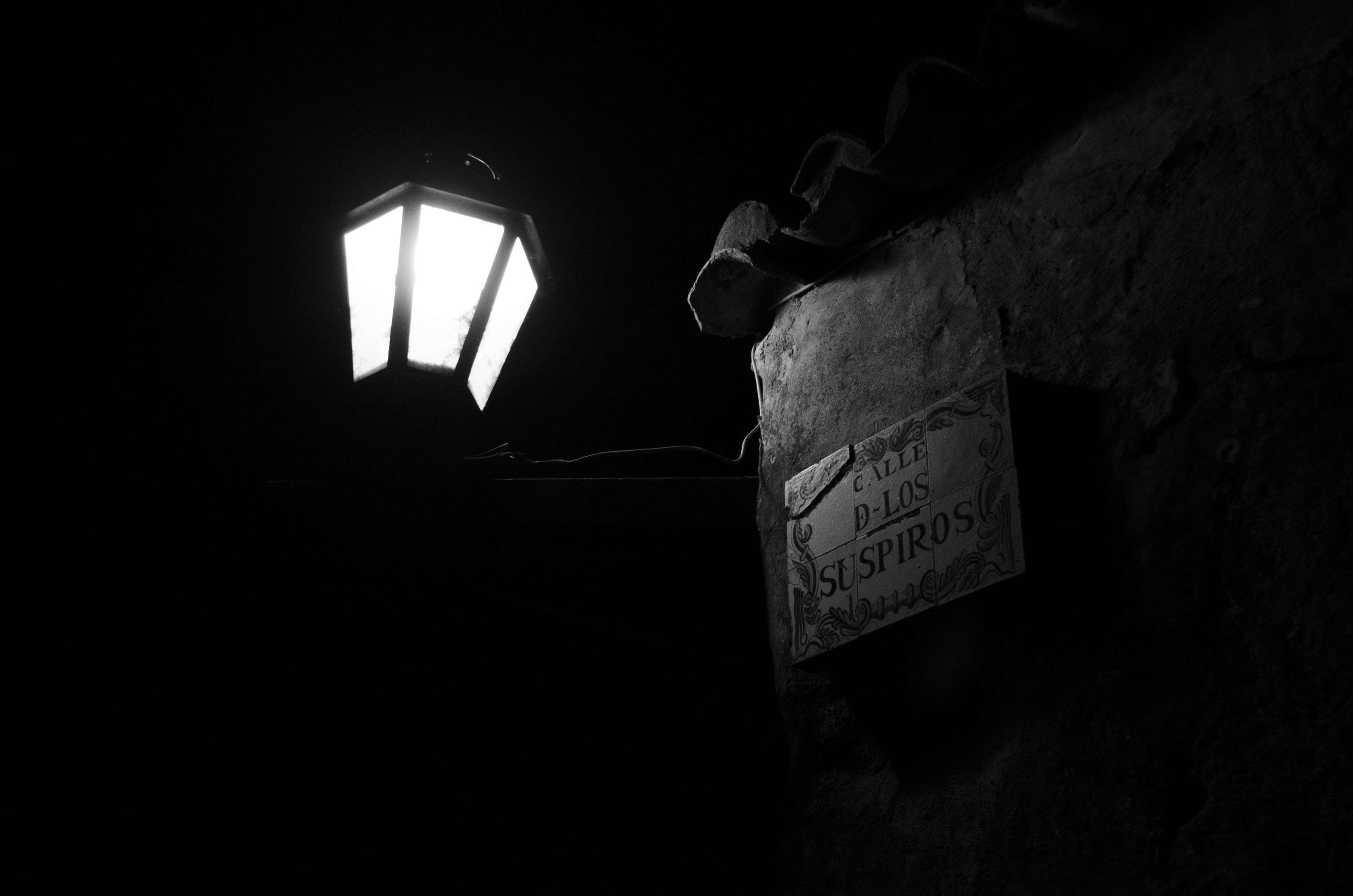 lantern, glowing streetlamp, weathered stone wall, 4K Desktop Wallpaper