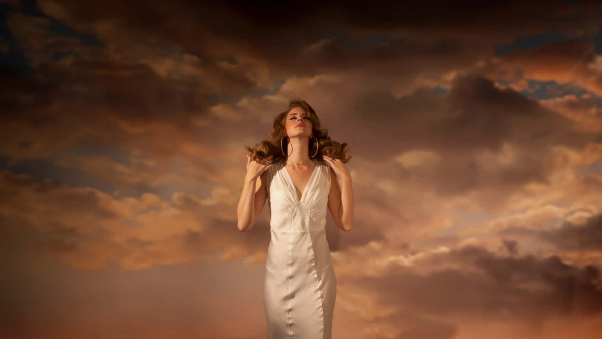 white dress, dramatic sunset sky, swirling orange and dark clouds, Full HD Desktop Wallpaper
