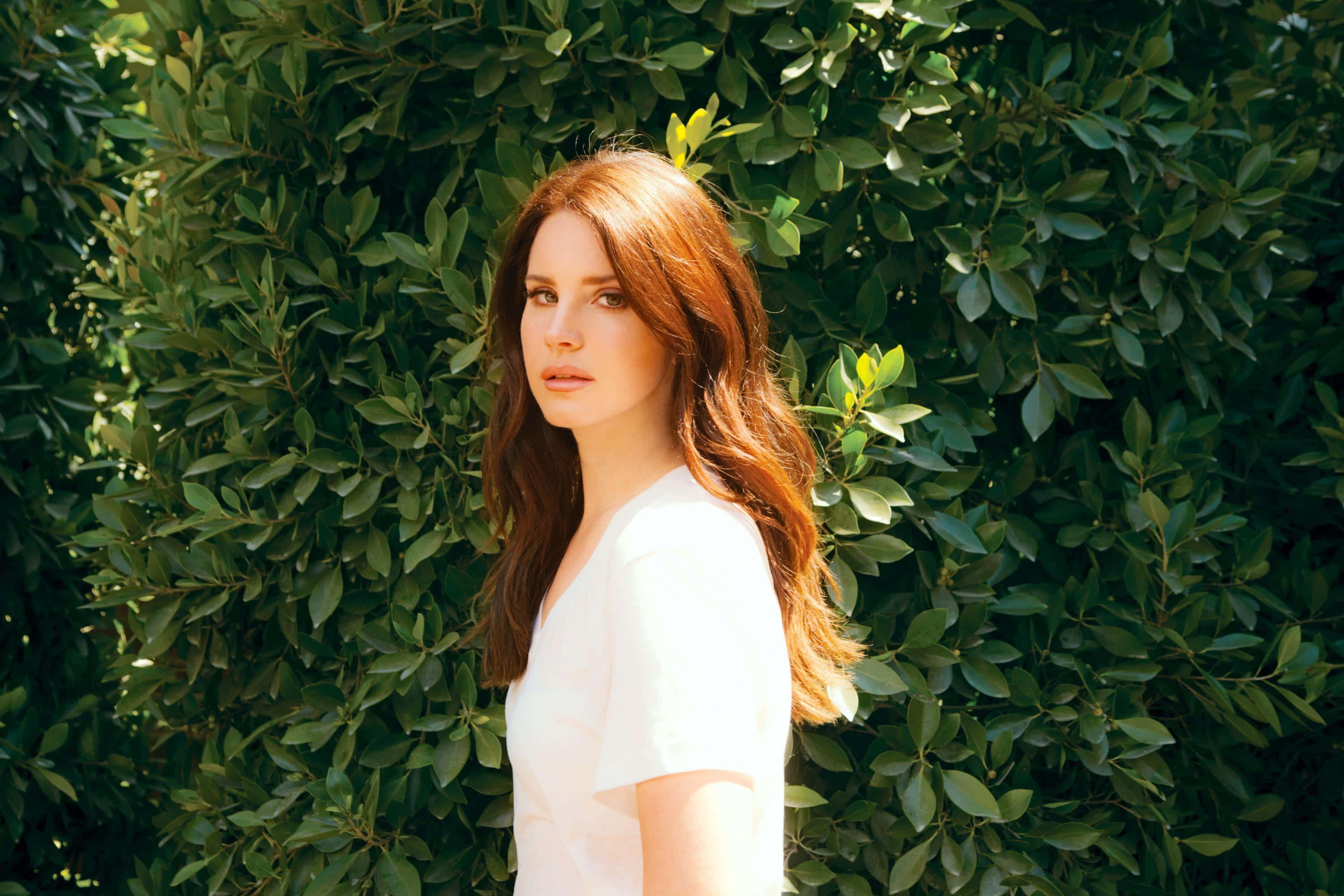 Lana del rey, green foliage, white shirt, 2K Desktop Wallpaper