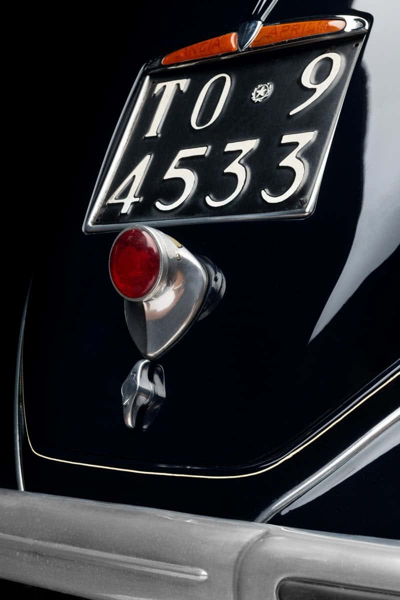 Lancia Aprilia, vintage black car, chrome trim, SD Phone Wallpaper