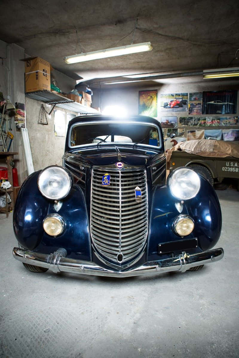 Lancia Aprilia, glossy deep blue, chrome grille, SD Phone Wallpaper