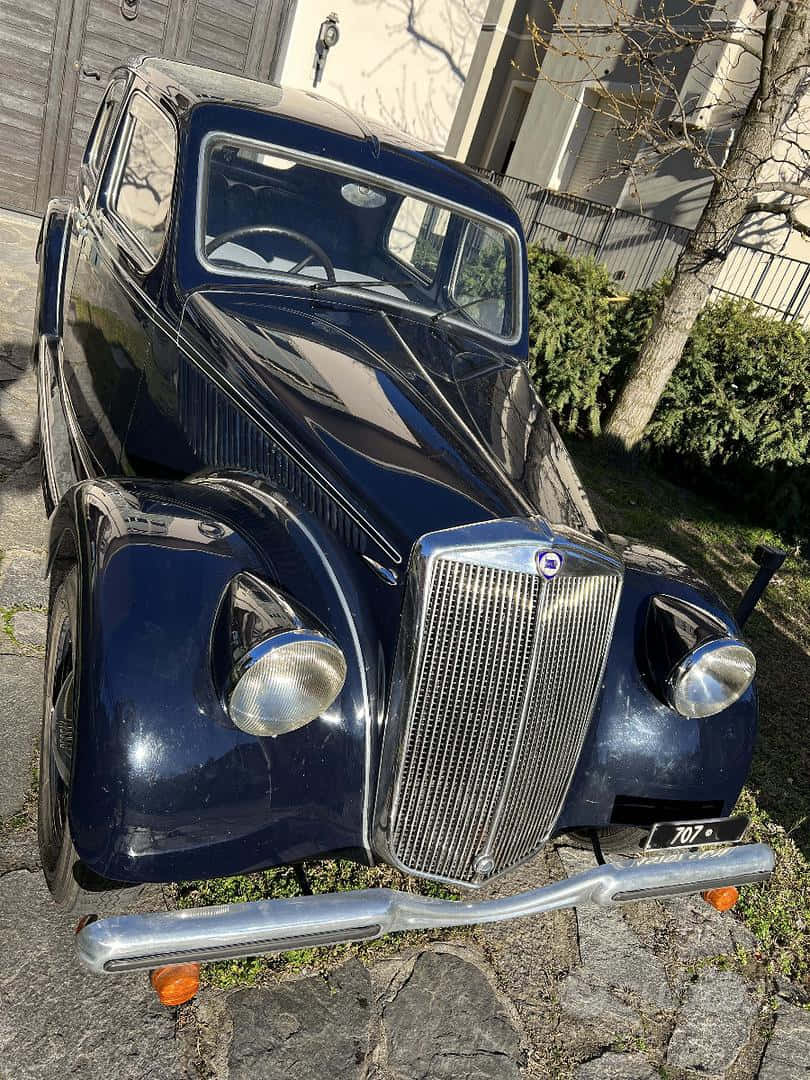 Lancia Aprilia, glossy deep blue, chrome grille, SD Phone Wallpaper
